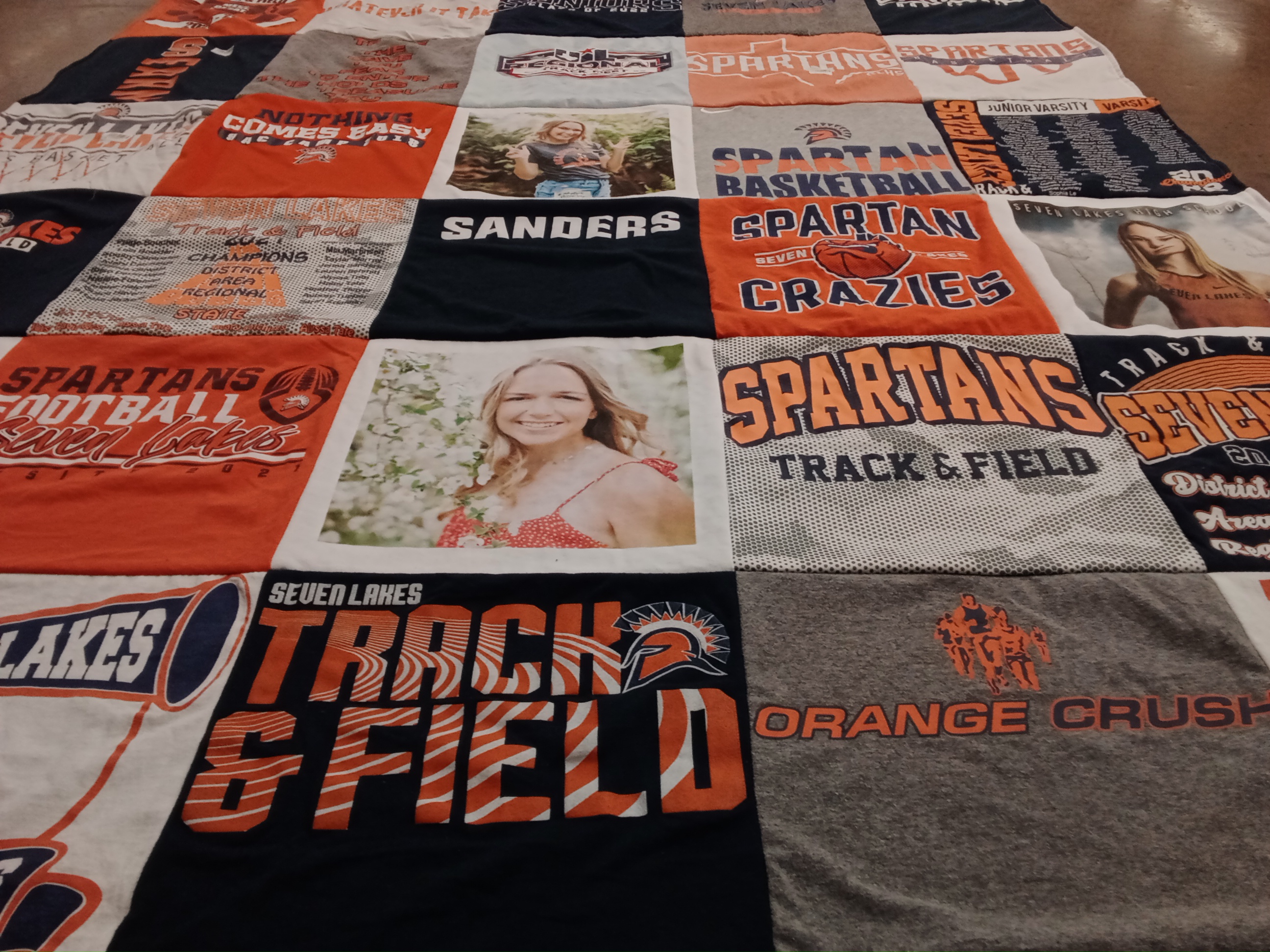 T-shirt quilt featuring seven lakes spartans by amy from TX