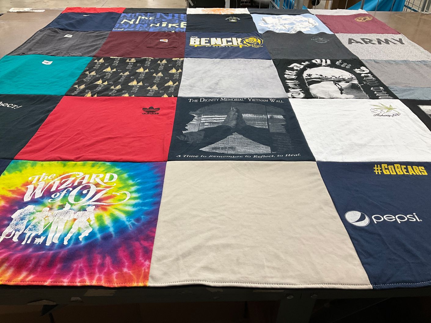 T-shirt quilt with theater, sports themes by Cheri from UT