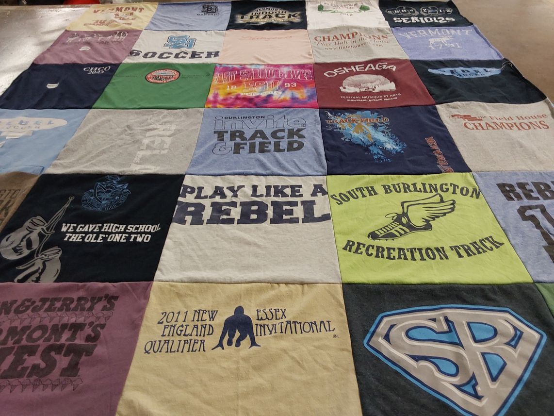 T-shirt quilt featuring south burlington recreation track by Ashley from CA
