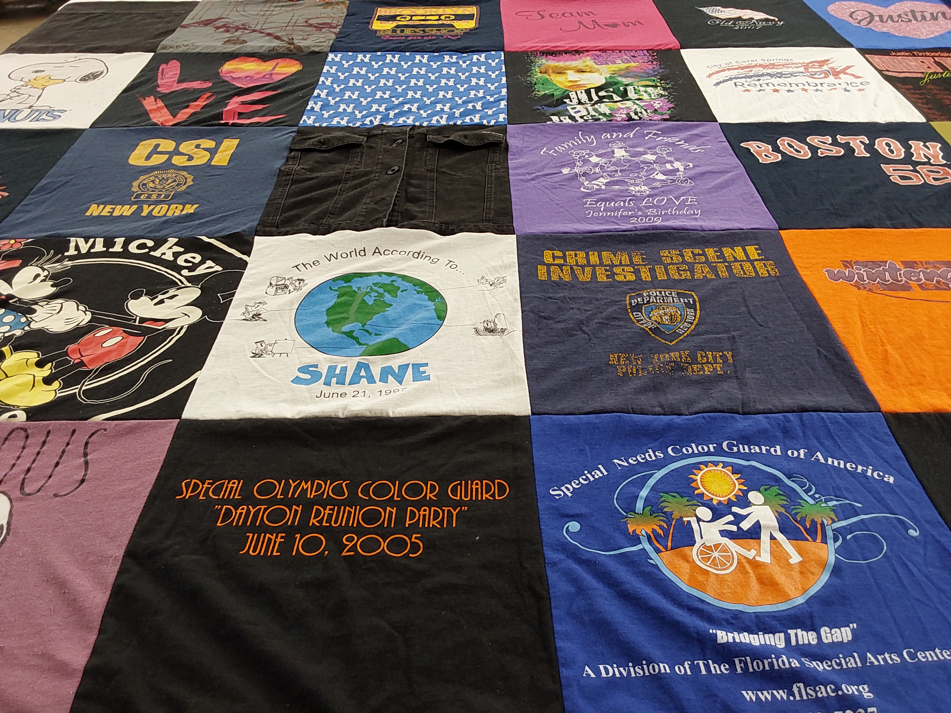 T-shirt quilt with family, friends themes by Barrie from FL