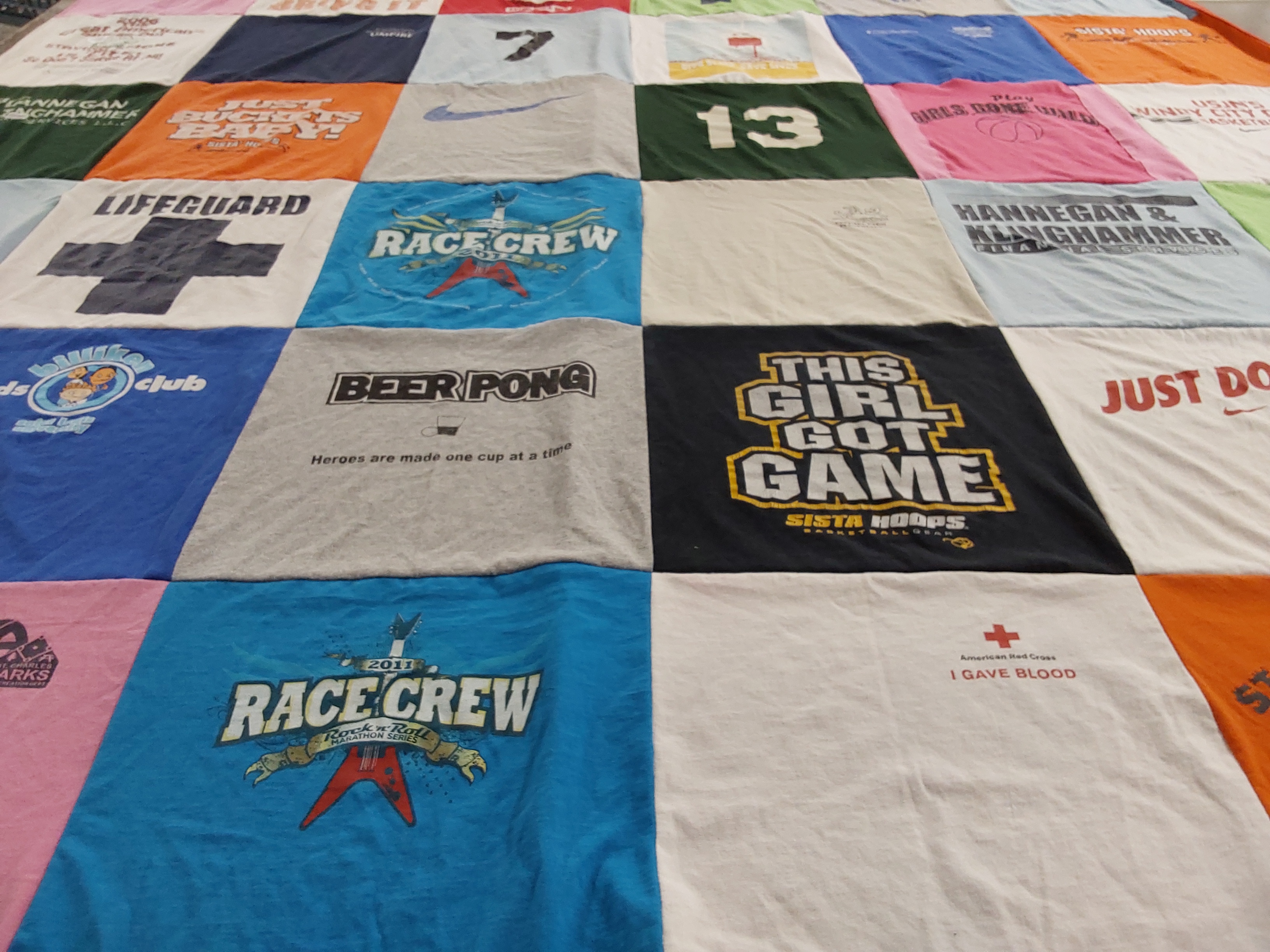 T-shirt quilt with sports, games themes by Tracy from AZ