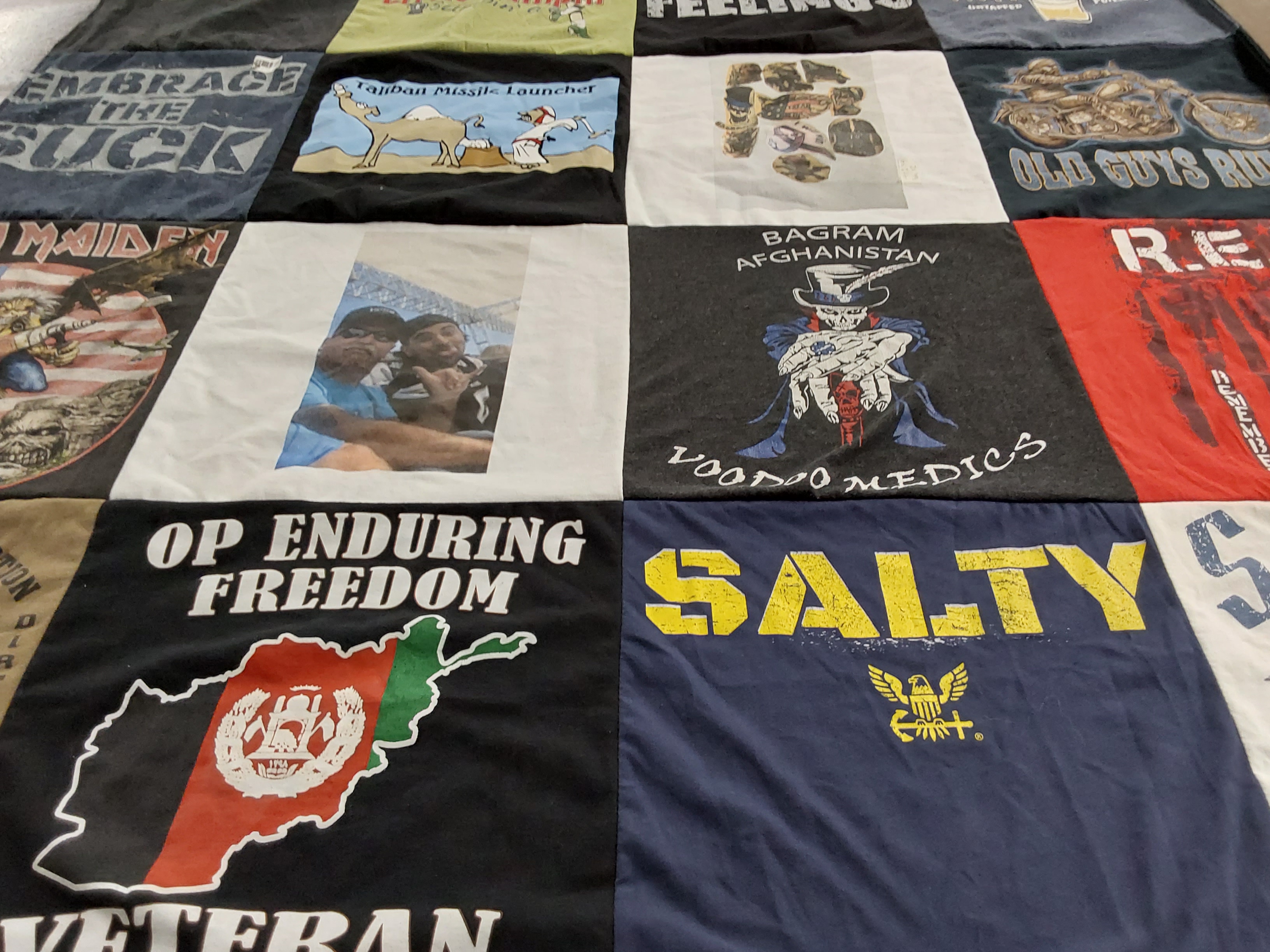 T-shirt quilt with military, veteran affairs themes by Henri from CA