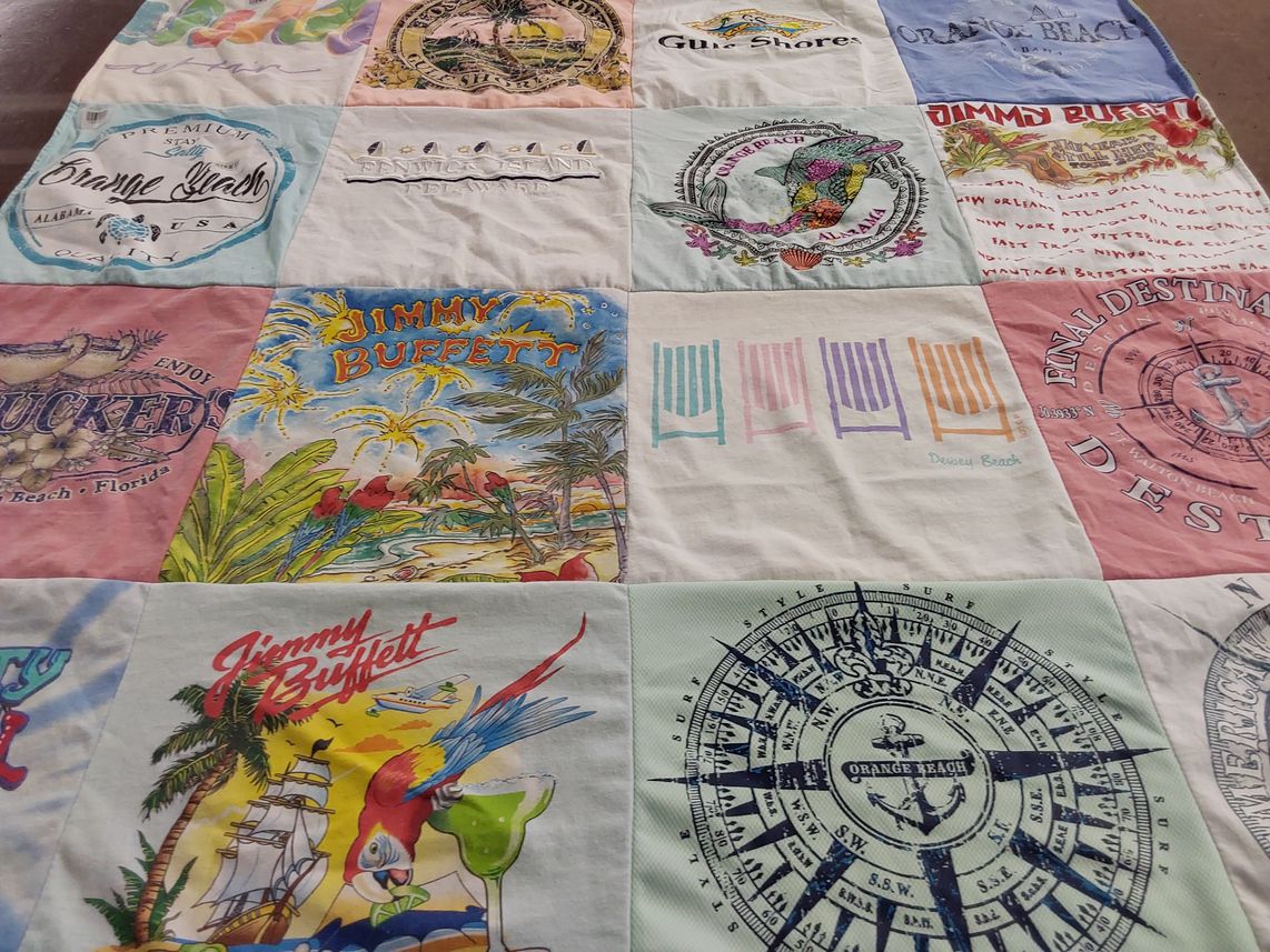 T-shirt quilt with beach, travel themes by Natalie from AR