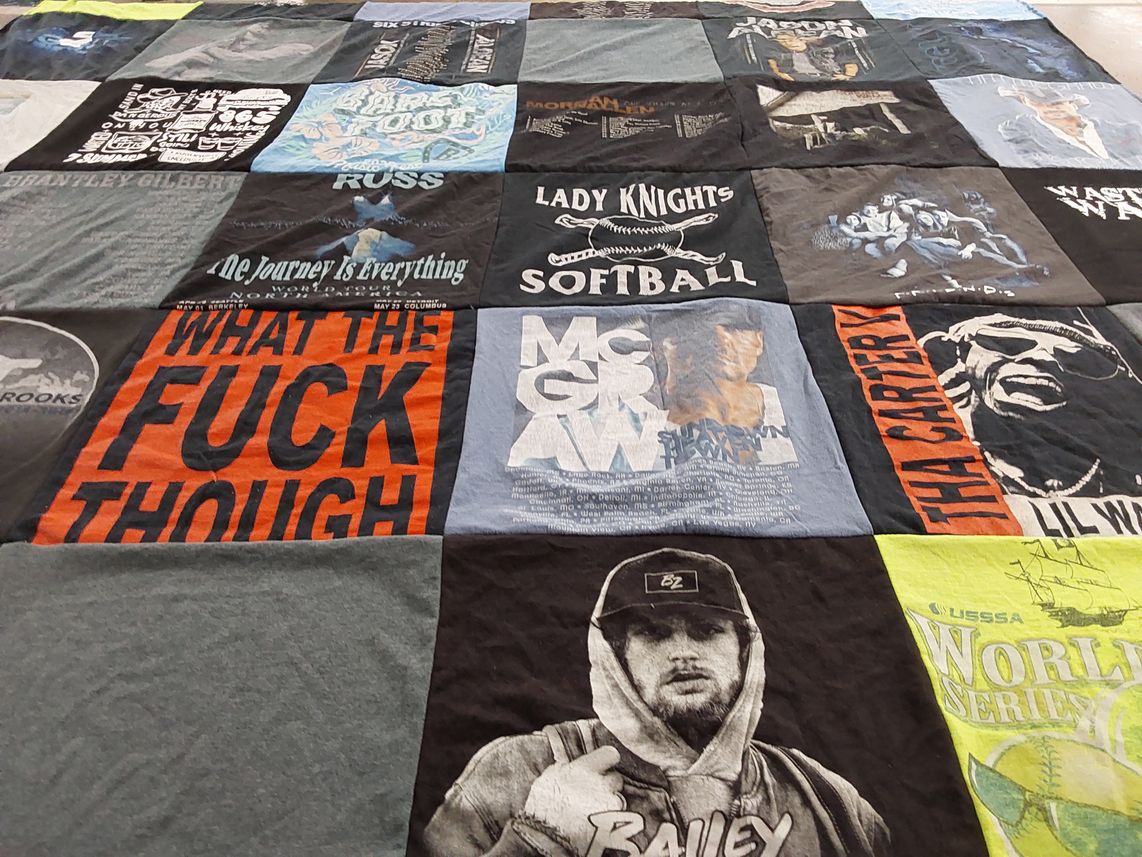 T-shirt quilt with music, sports themes by mary from MD