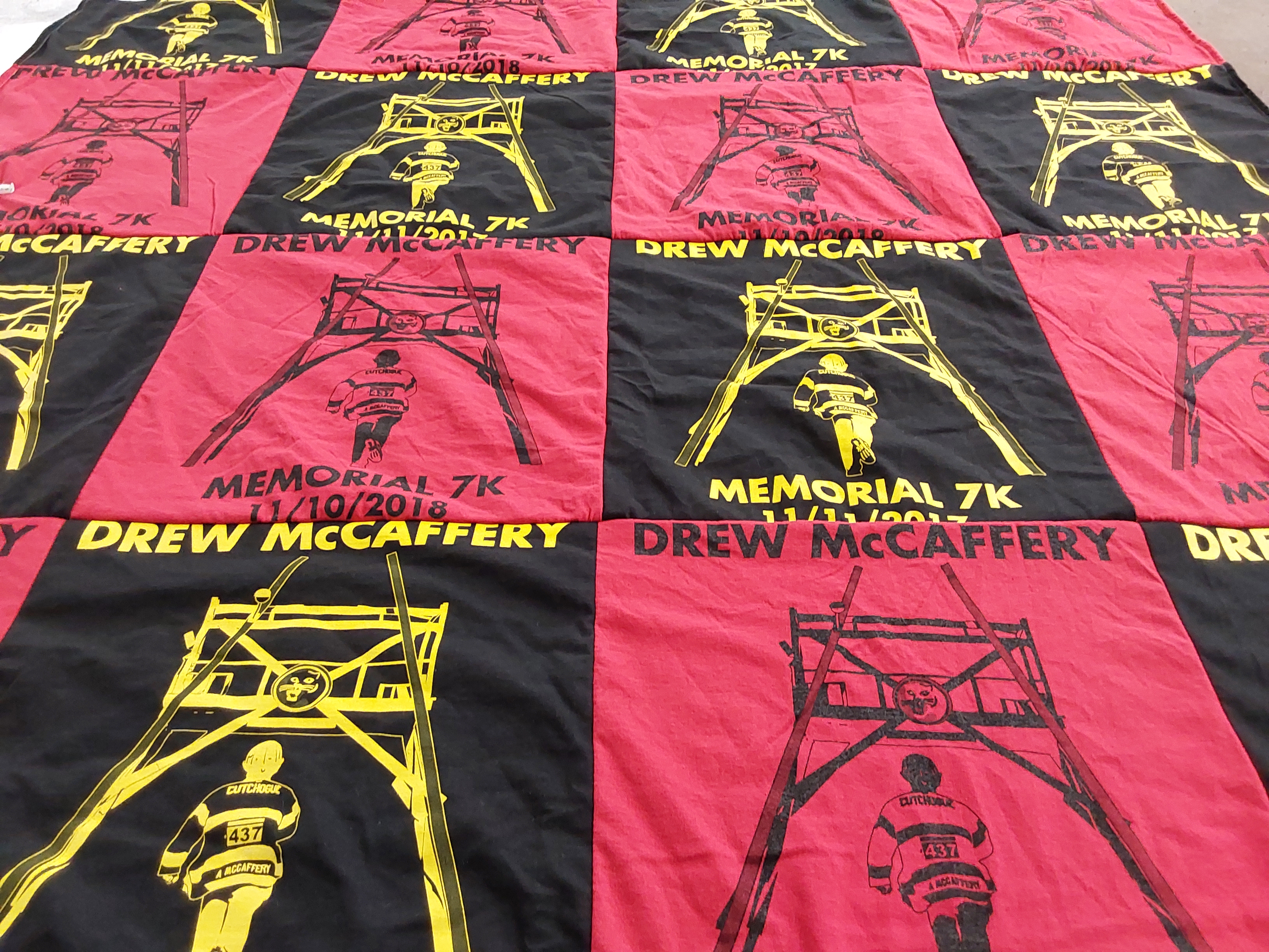 T-shirt quilt with running, memorial events themes by Lynn from NY