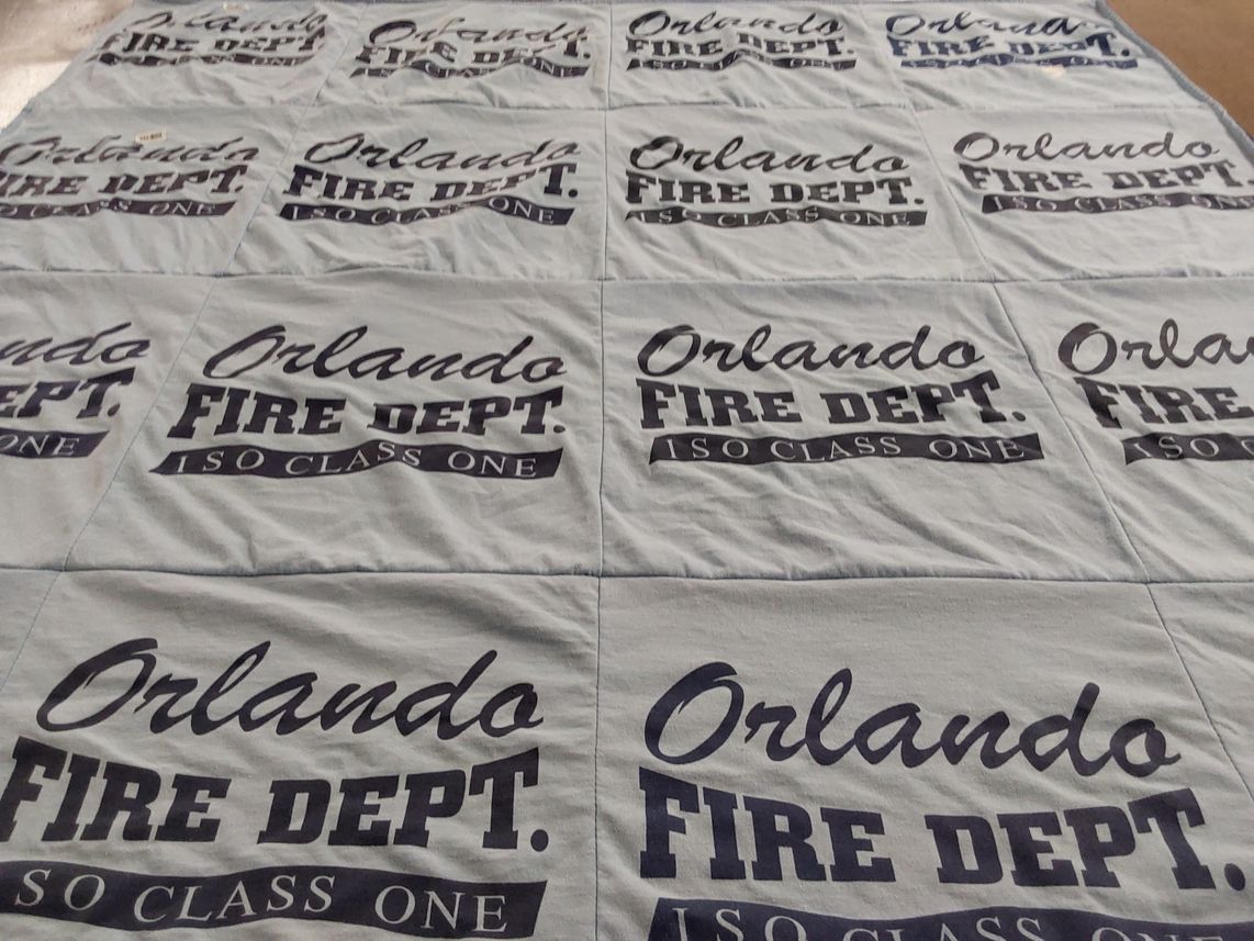 T-shirt quilt with firefighting, community service themes by John from FL