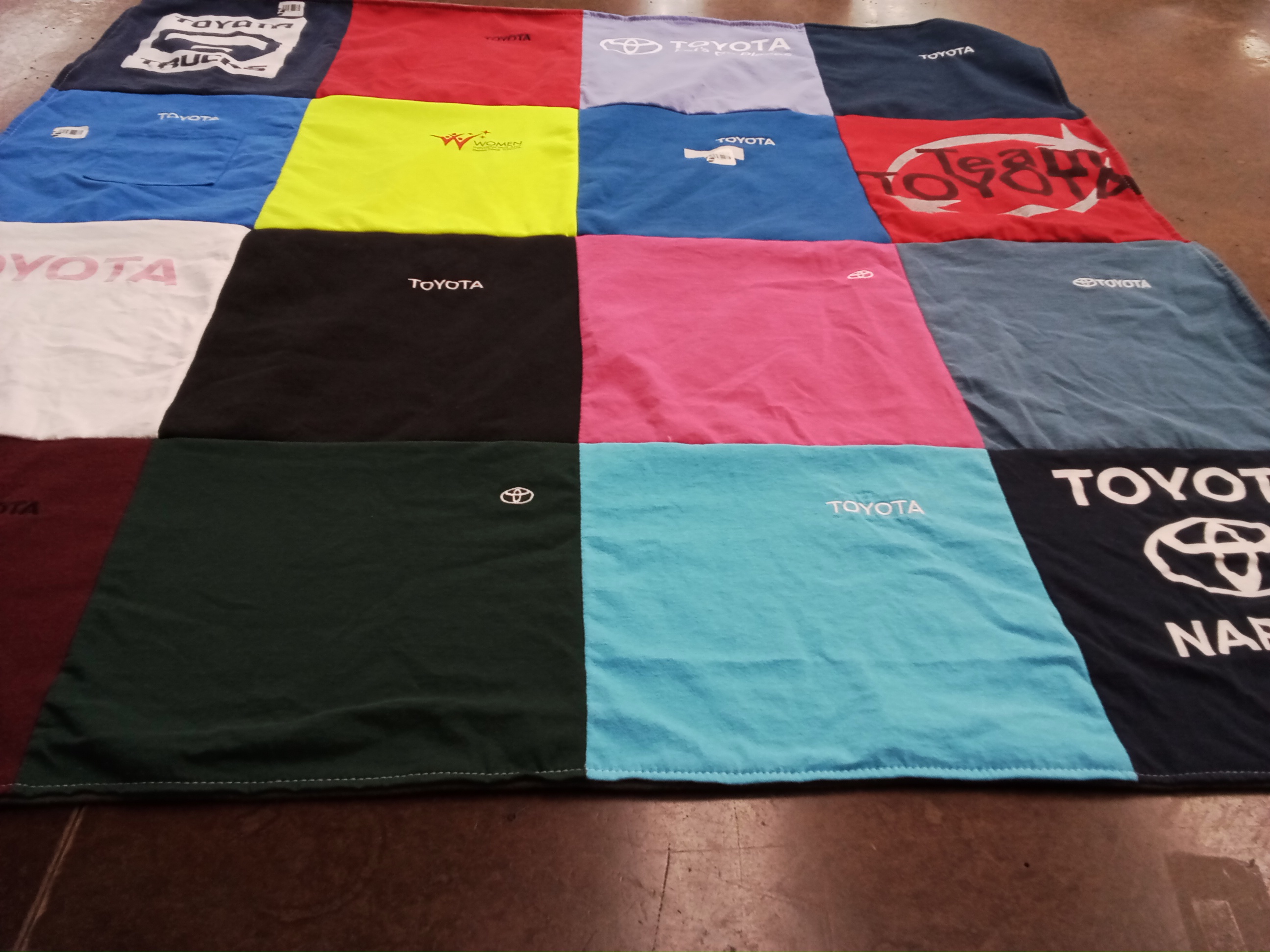T-shirt quilt with automobiles, manufacturing themes by Sharon from KY