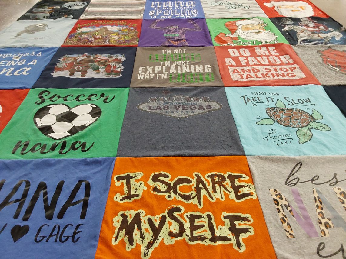 T-shirt quilt with soccer, travel themes by Brandi from AR