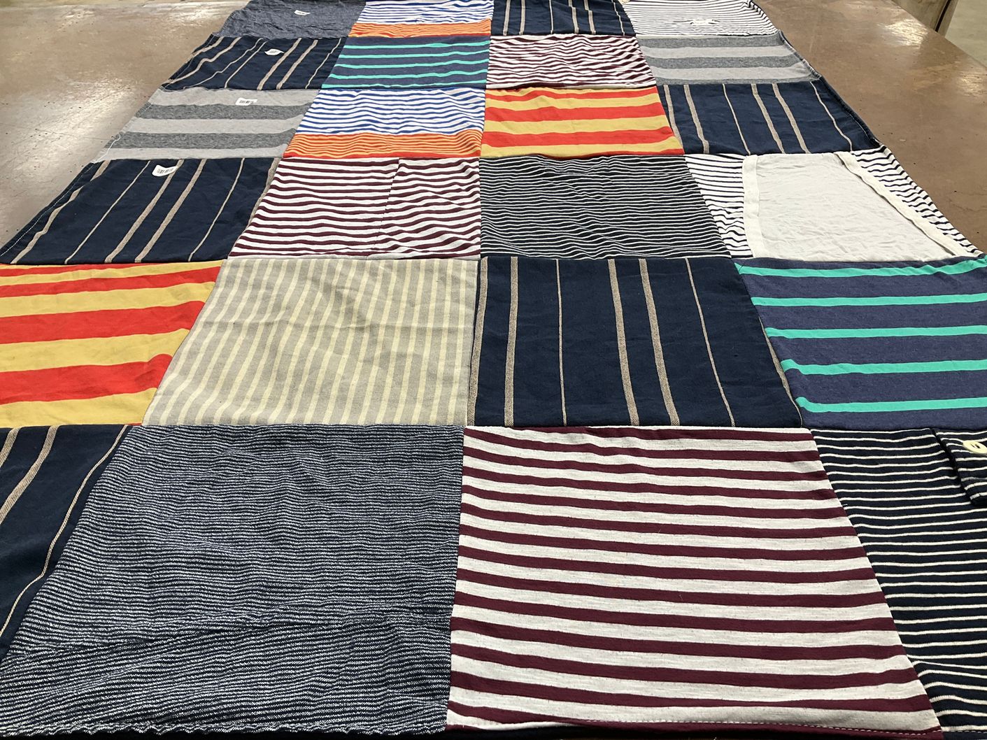 T-shirt quilt with textiles, crafting themes by Sarah from NE