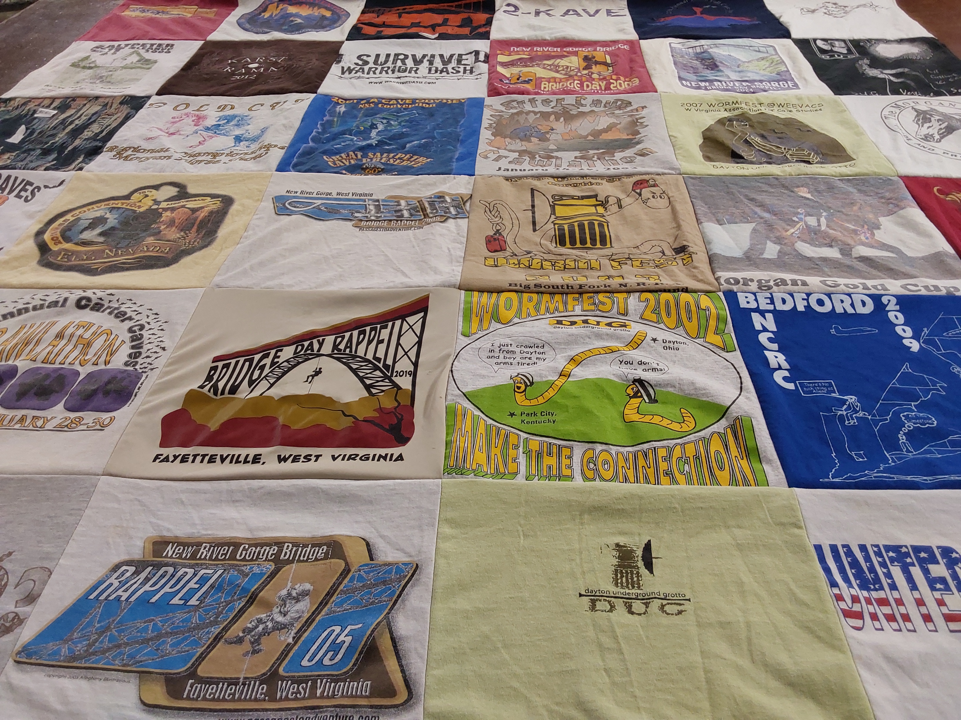 T-shirt quilt with caving, outdoor activities themes by Tama from OH
