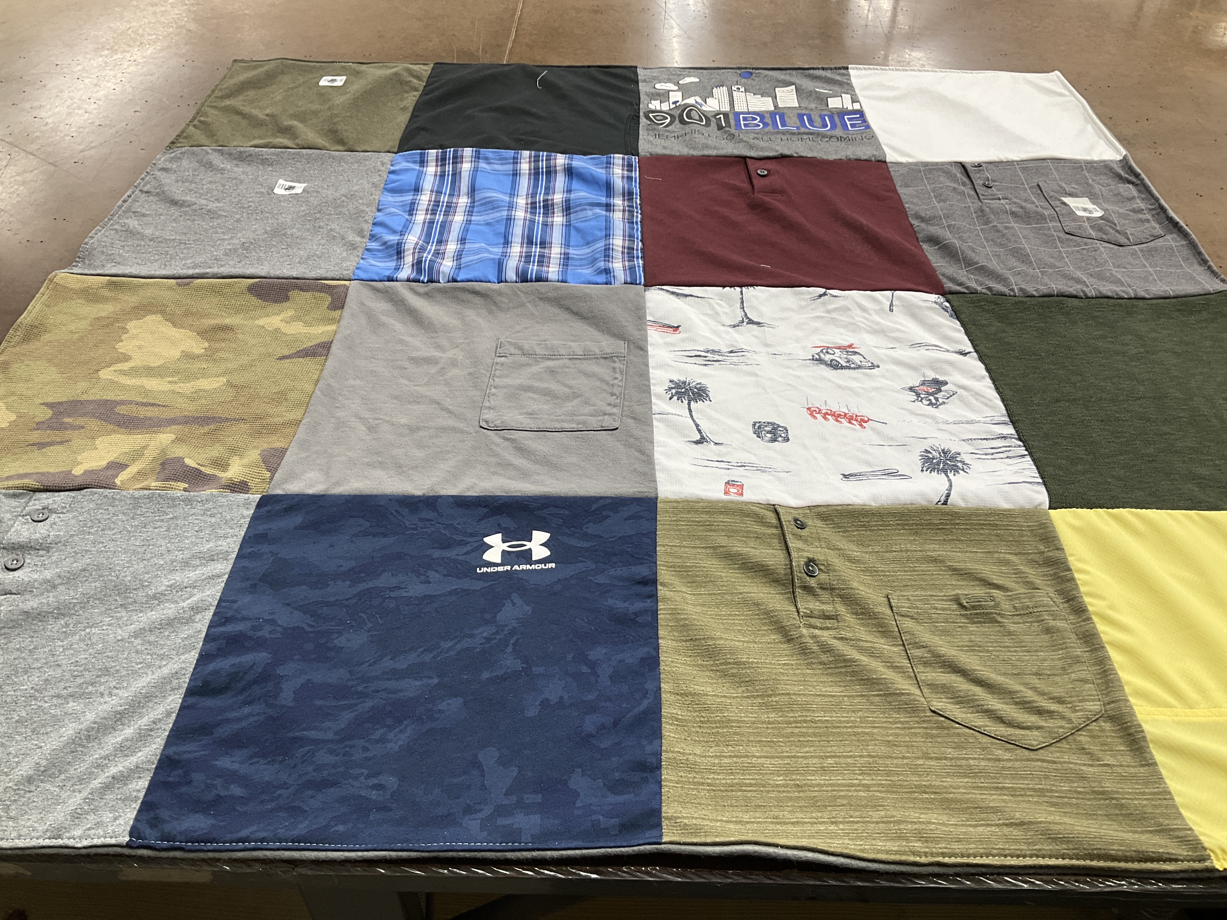 T-shirt quilt with sports, fashion themes by Holly from TN