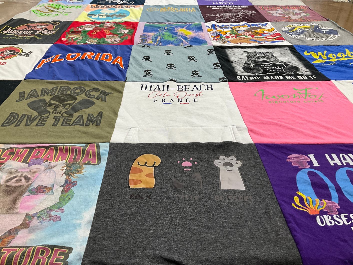 T-shirt quilt with marine life, pets themes by SUSAN L from SC