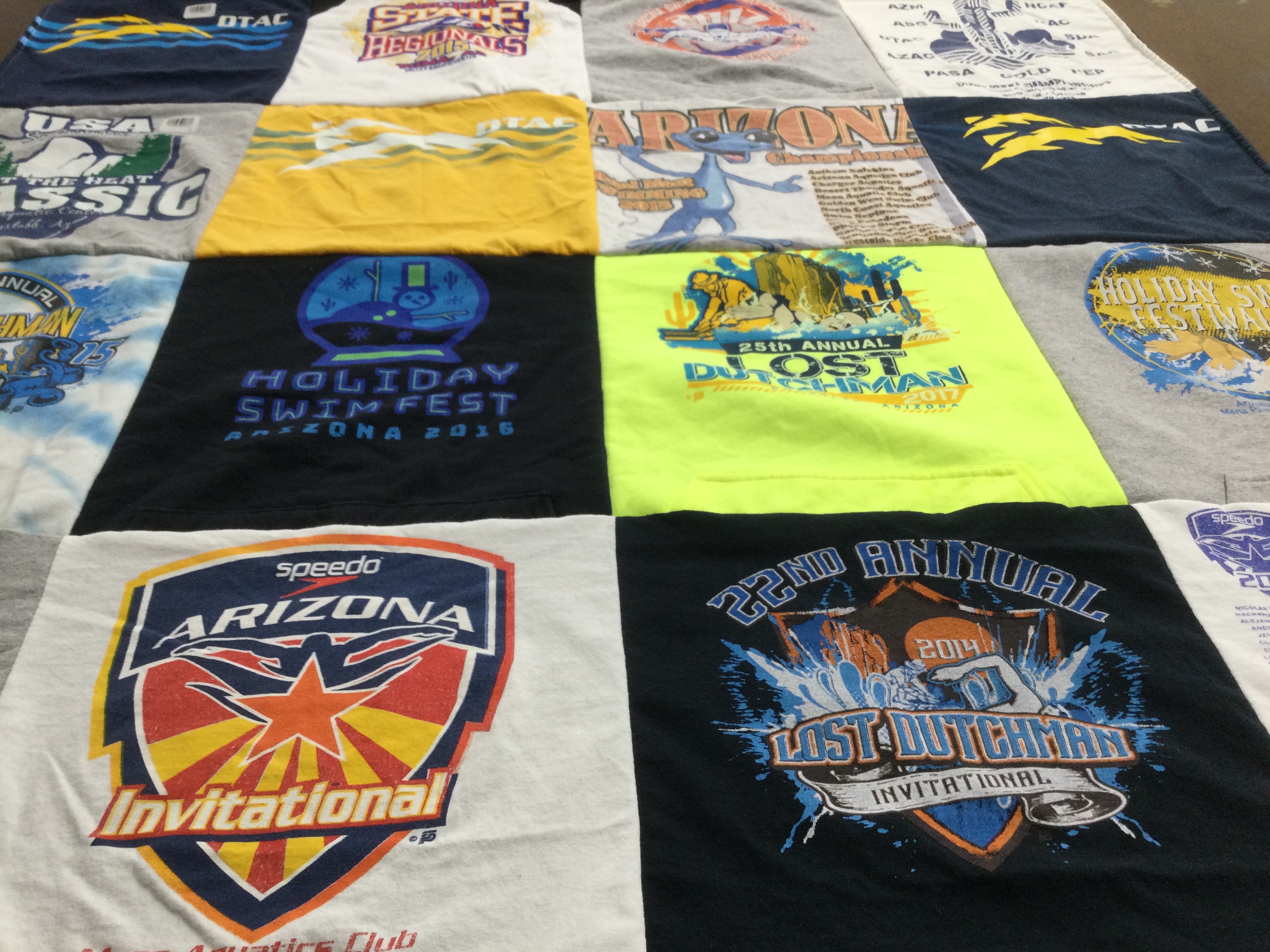 T-shirt quilt with swimming, competitions themes by Megan from AZ