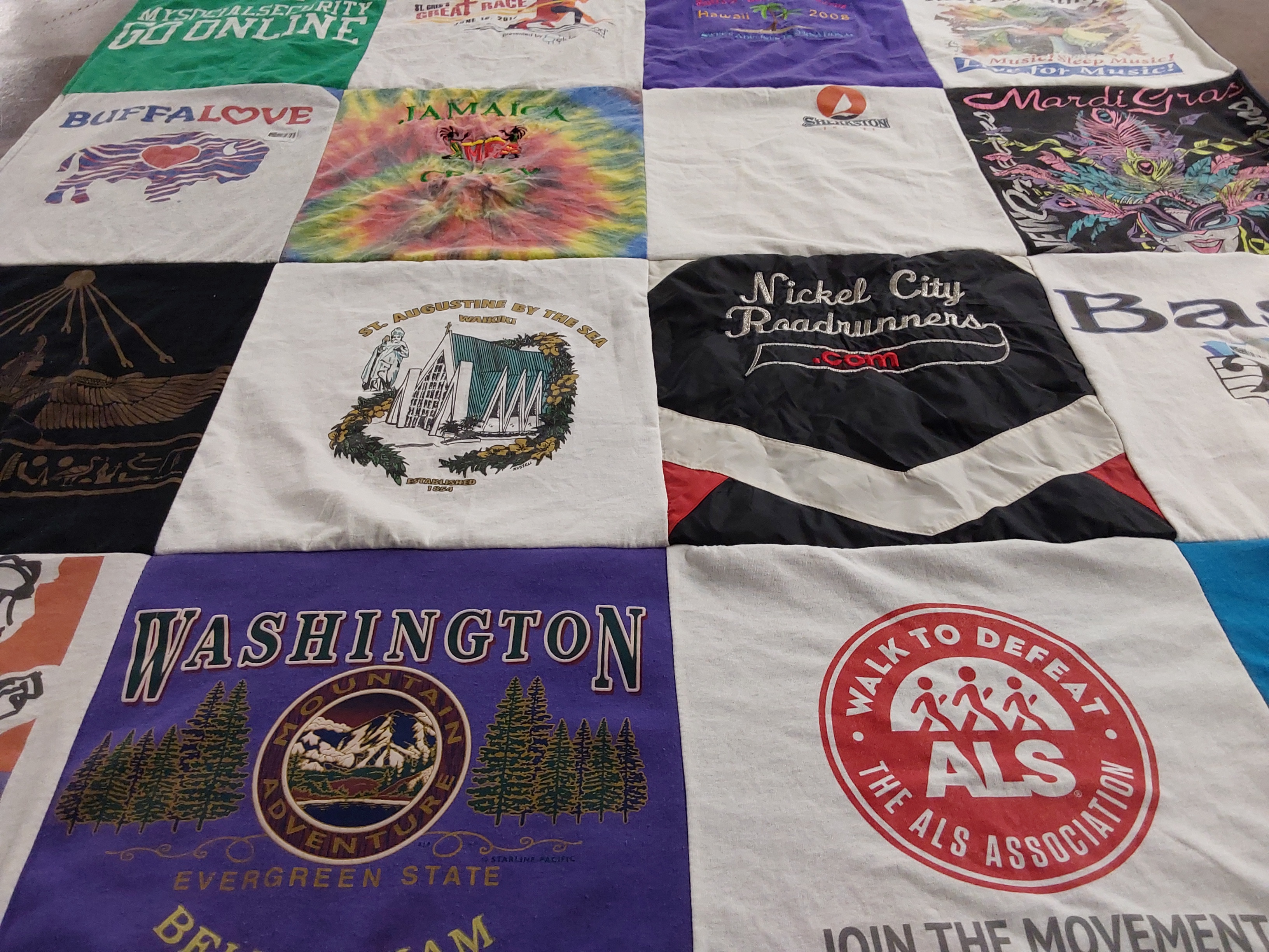 T-shirt quilt with travel, running themes by Veronica from NY