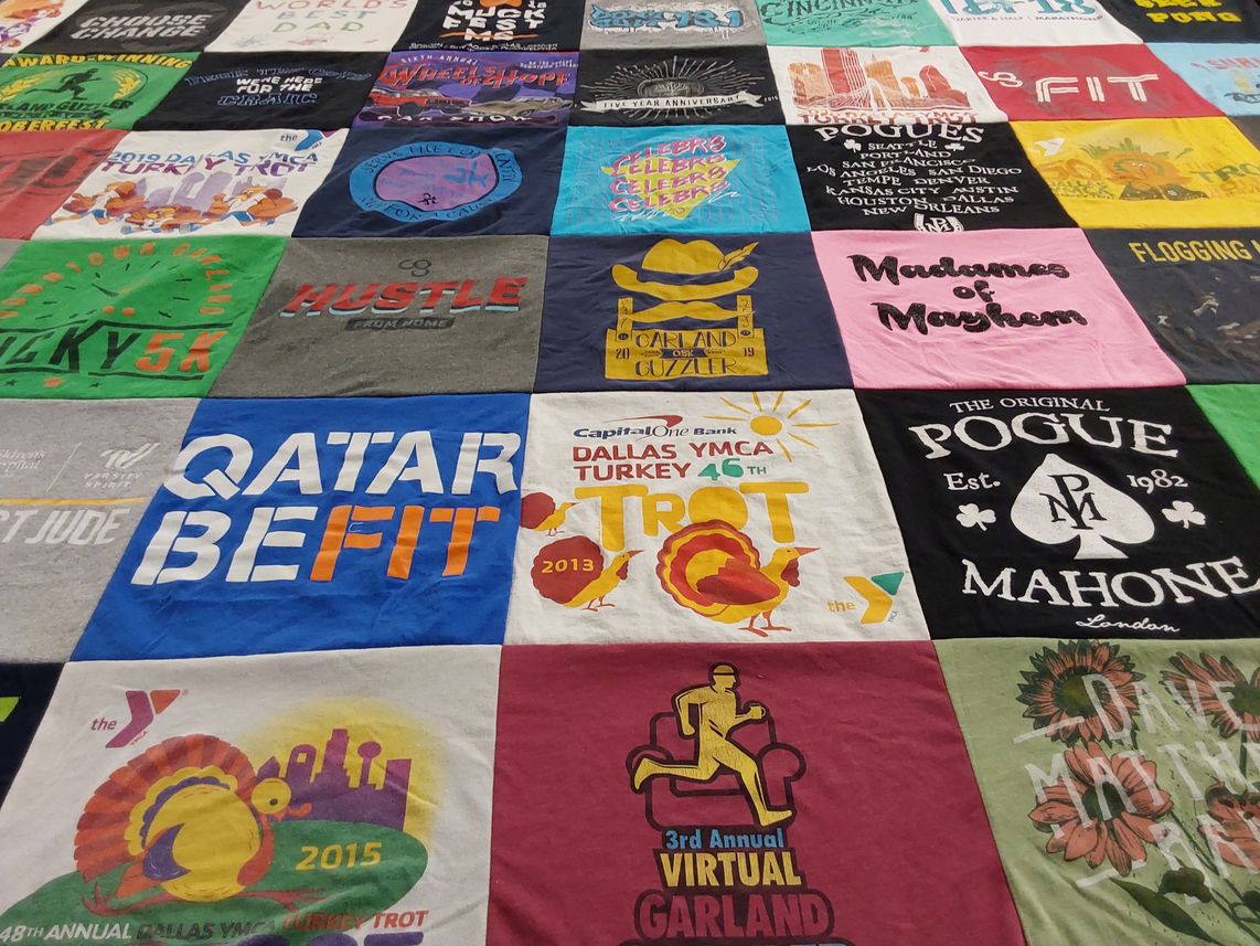 T-shirt quilt with fitness, running themes by Maire from TX