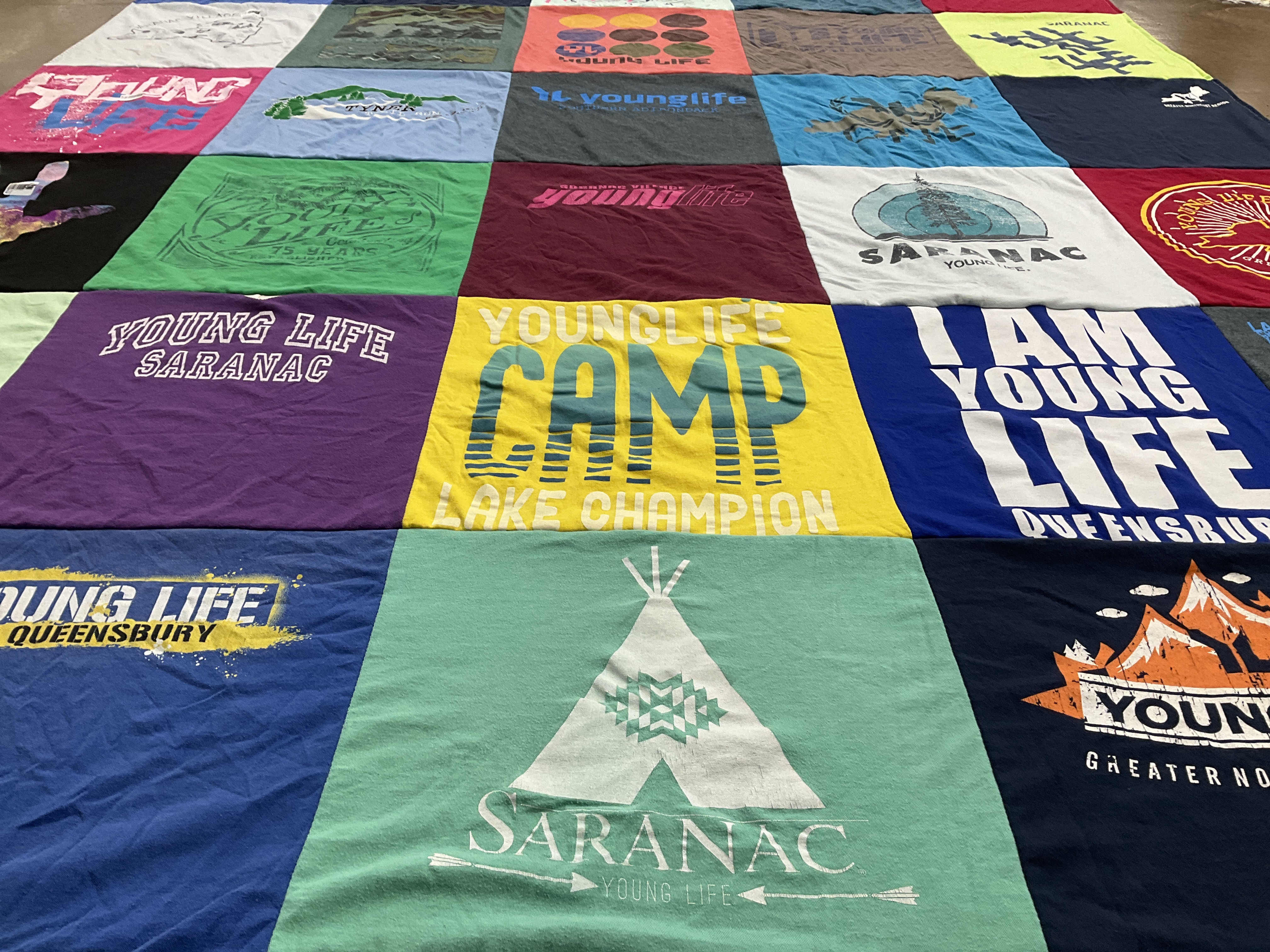T-shirt quilt with youth development, outdoor activities themes by Maggie from NY