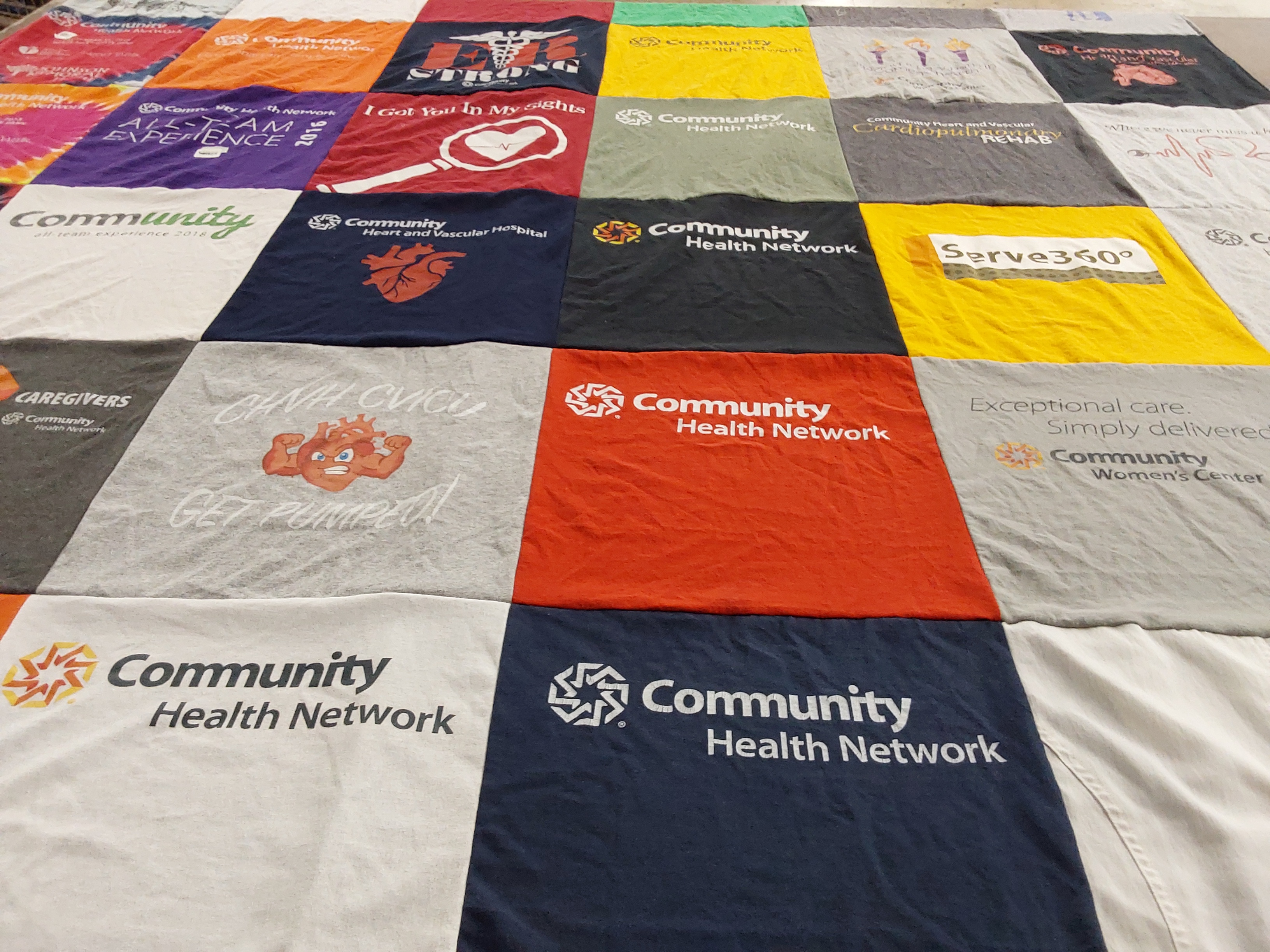 T-shirt quilt with healthcare, community service themes by Kelly from IN