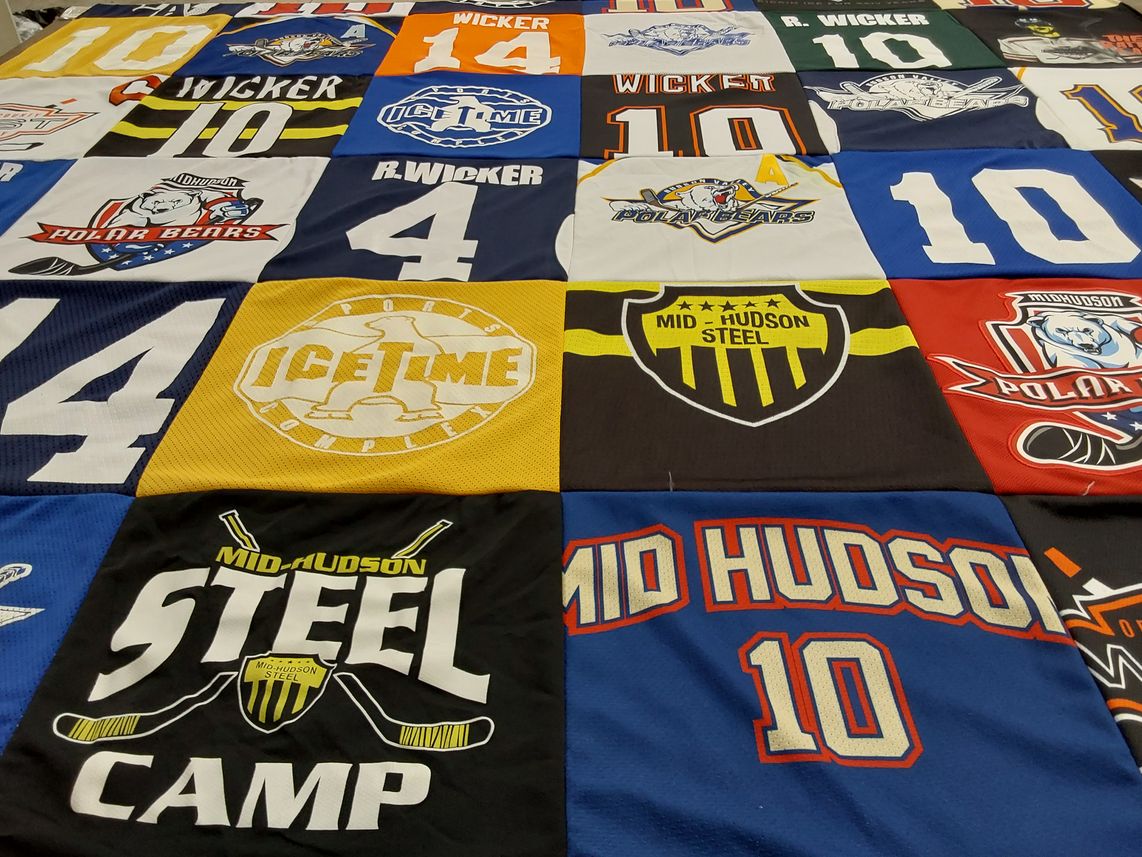 T-shirt quilt with ice hockey, sports themes by Lisa from NY