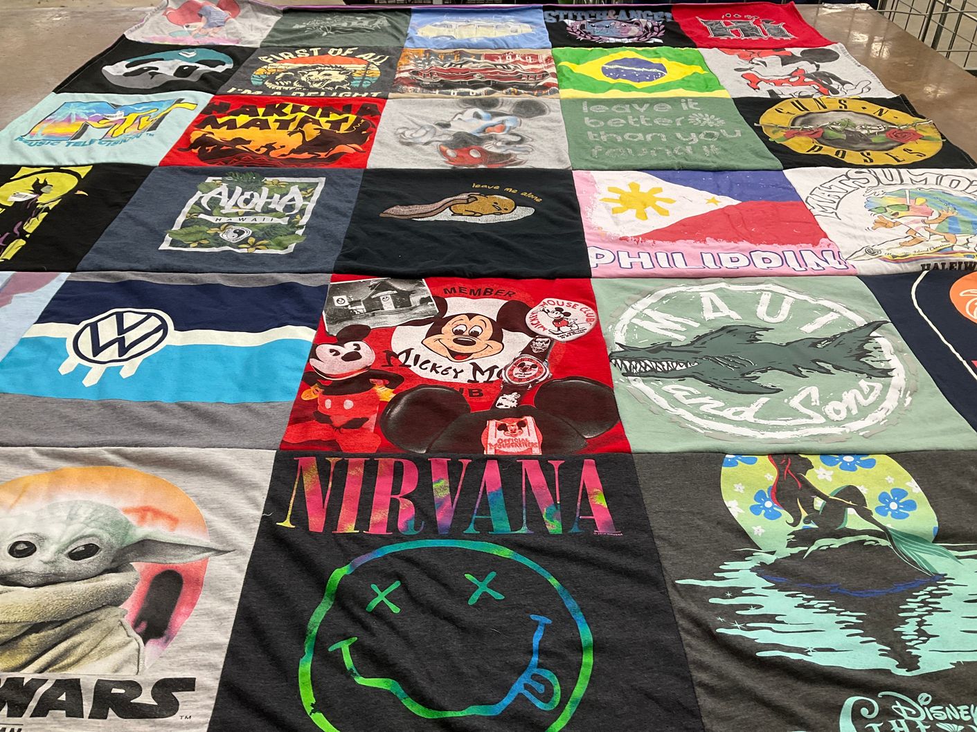 T-shirt quilt with music, disney themes by Warren J  from OK