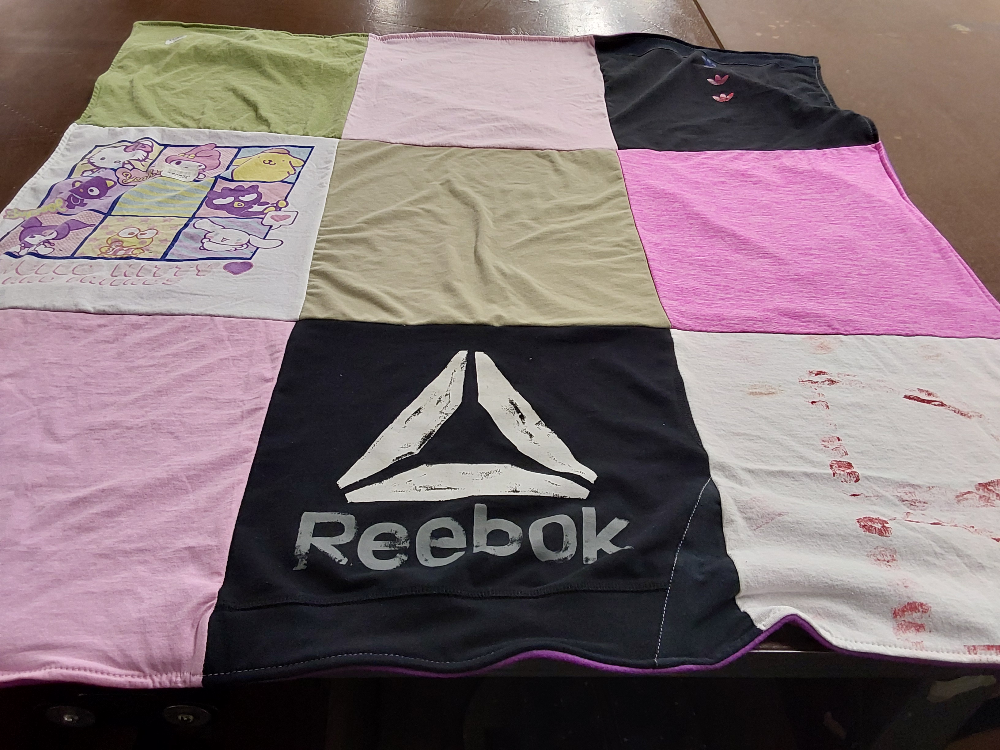 T-shirt quilt with cartoons, fitness themes by Kathy from FL
