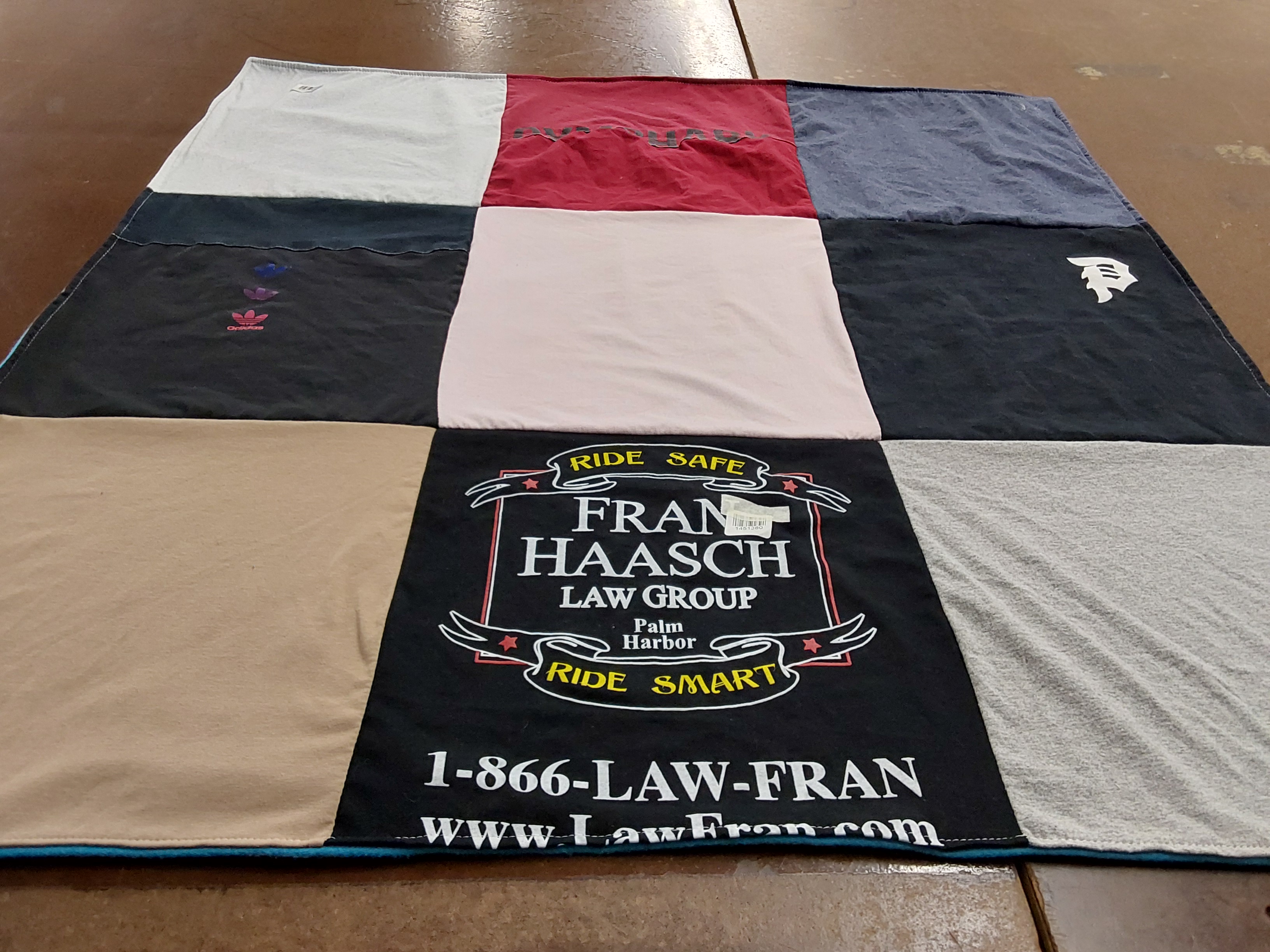 T-shirt quilt with law, safety themes by Kathy from FL