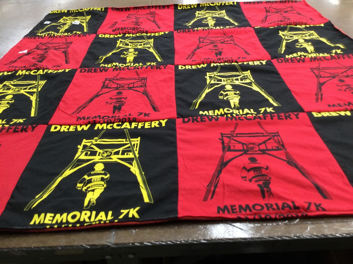 T-shirt quilt with running, memorial events themes by Lynn from NY