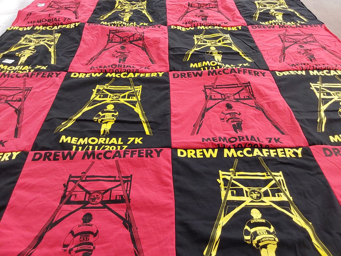 T-shirt quilt with running, memorial events themes by Lynn from NY