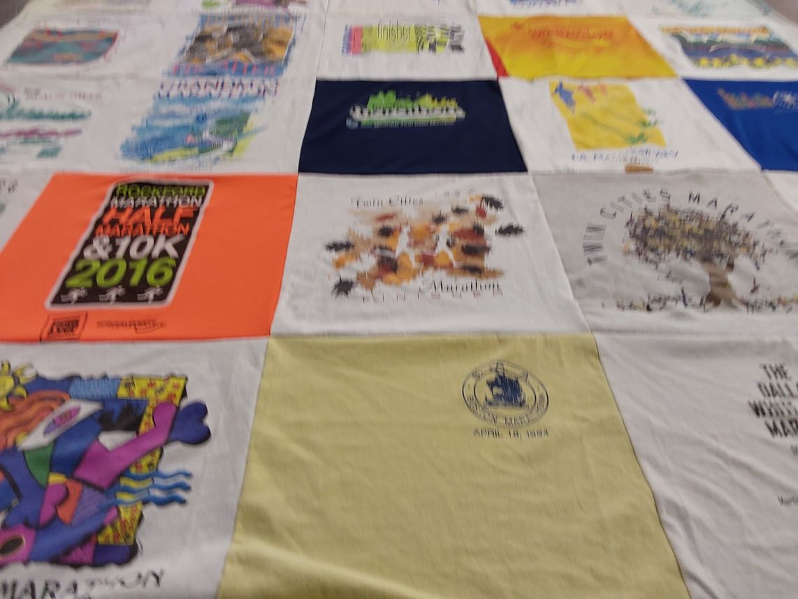 T-shirt quilt with running, sports themes by Beth from WI