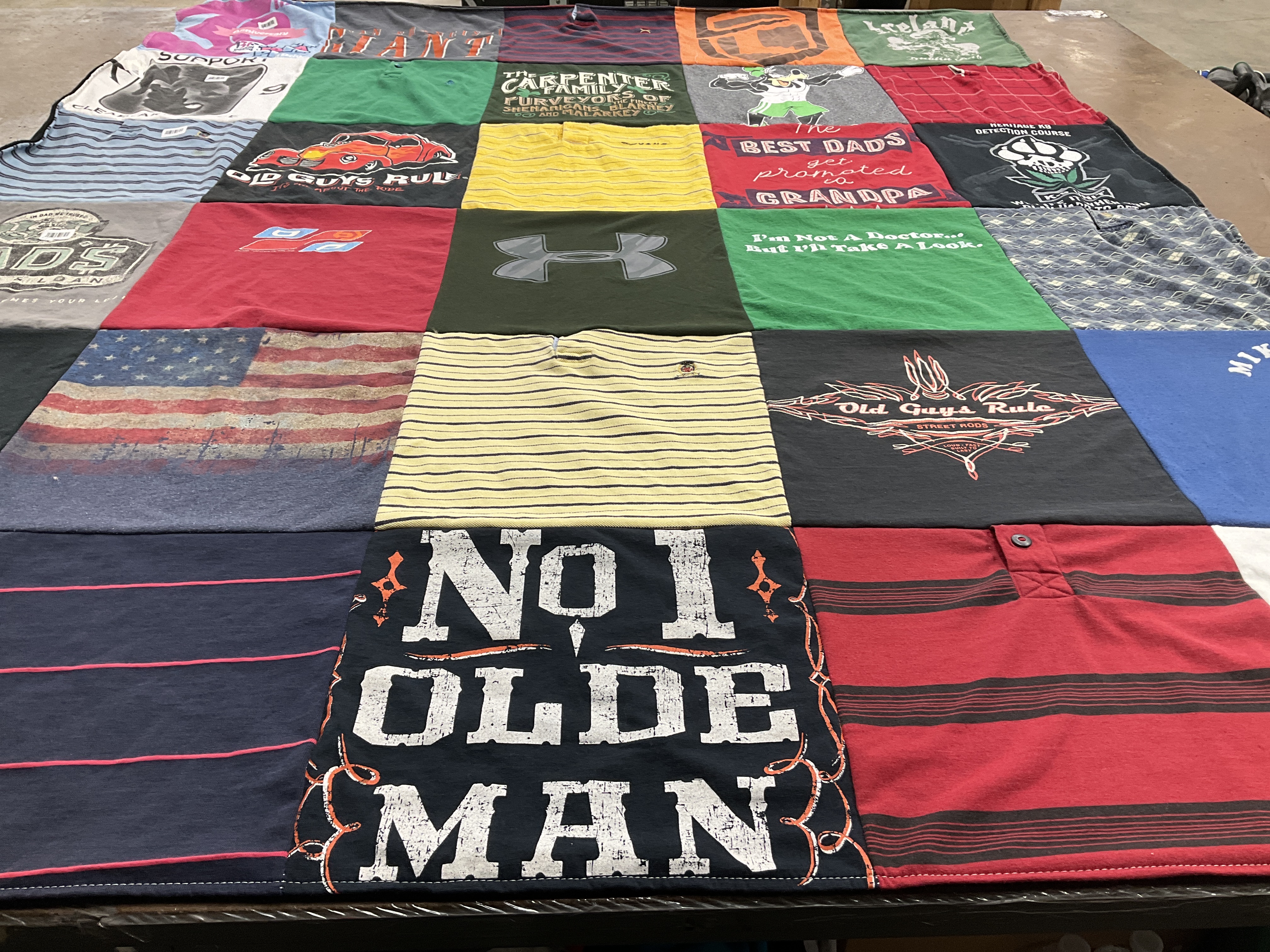 T-shirt quilt with fatherhood, celebration themes by Tamara from CA