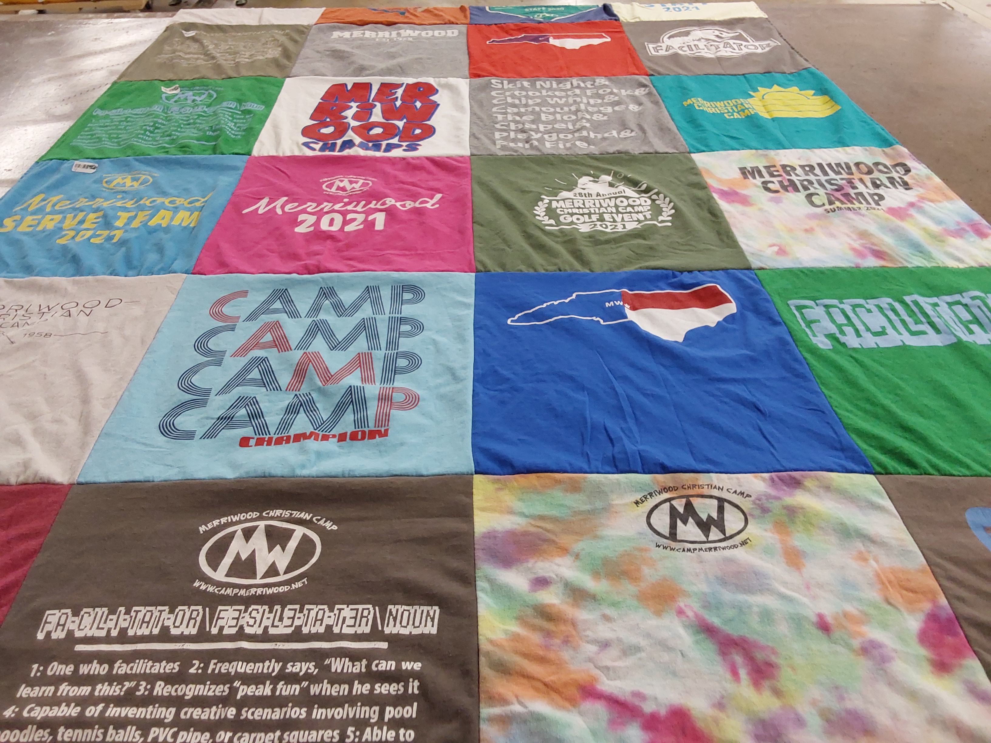T-shirt quilt with camping, facilitation themes by Angie from NC