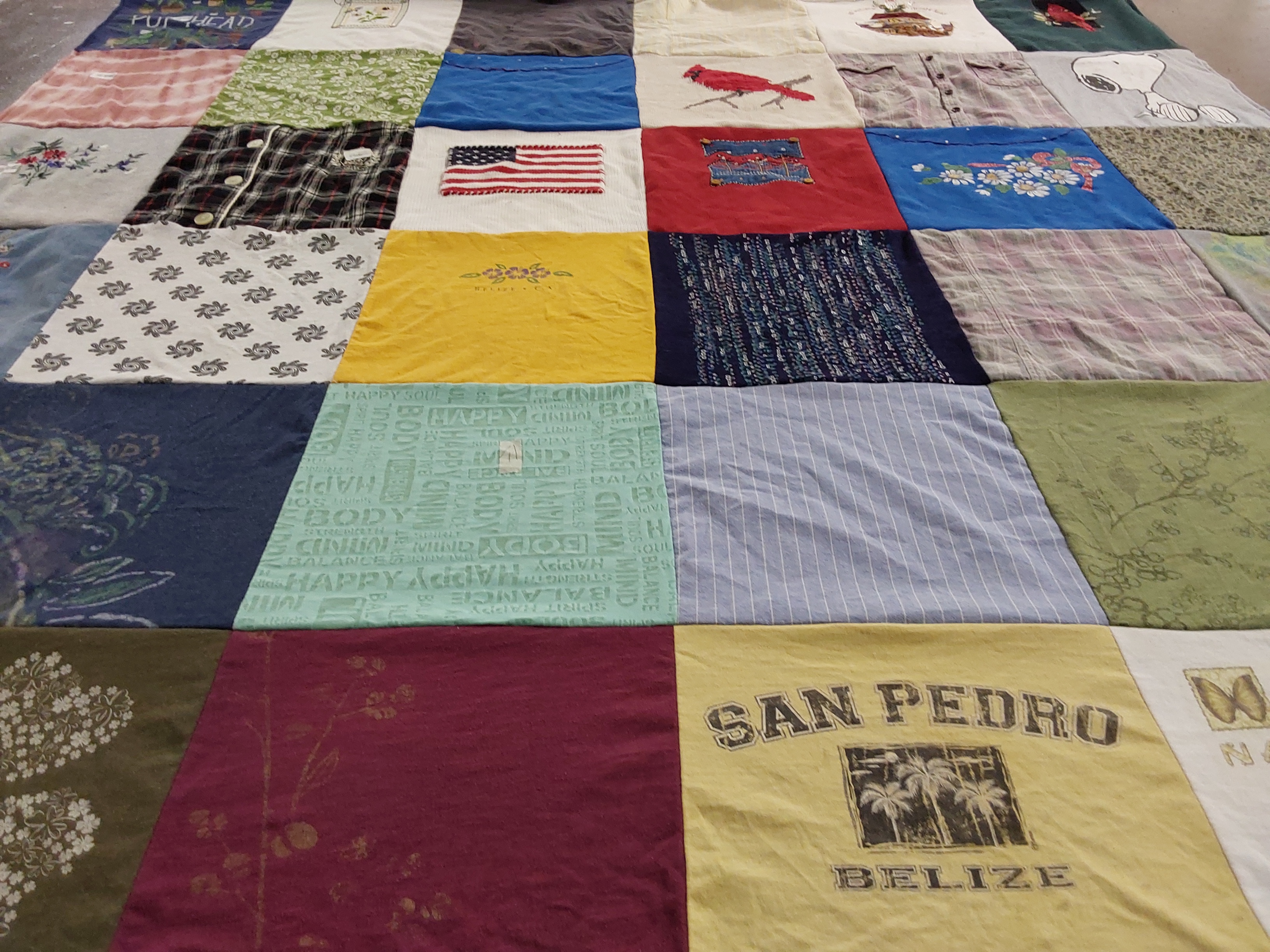 T-shirt quilt with golfing, travel themes by Kerri from GA