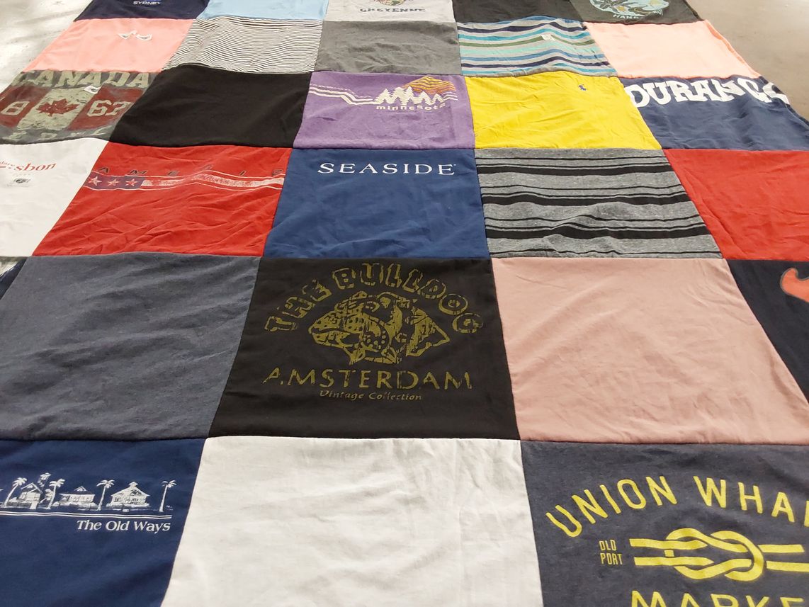 T-shirt quilt with travel, vintage clothing themes by STEVE from TX