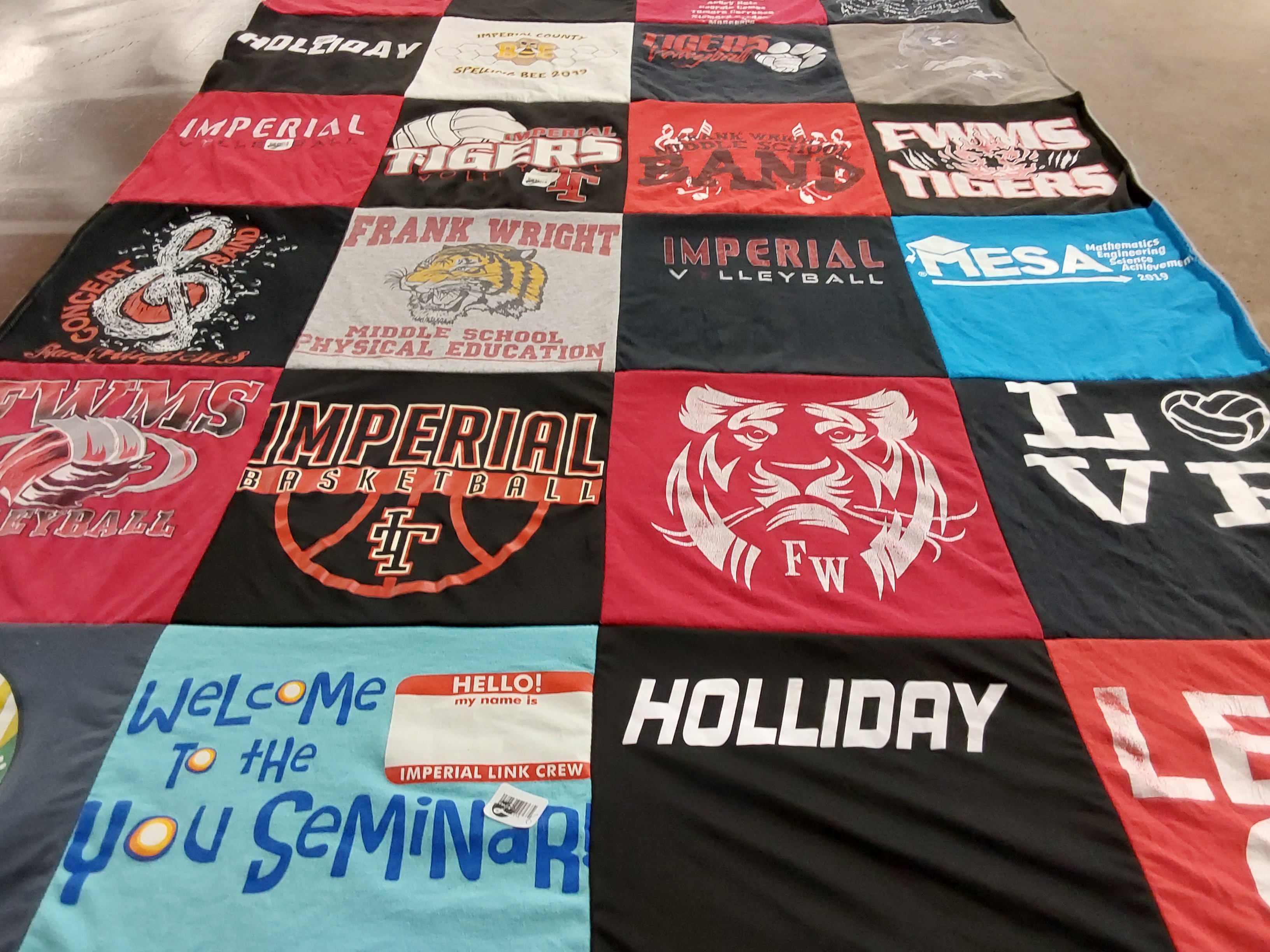 Custom Project Repat t-shirt quilt featuring shirts from frank wright middle school, imperial high school.