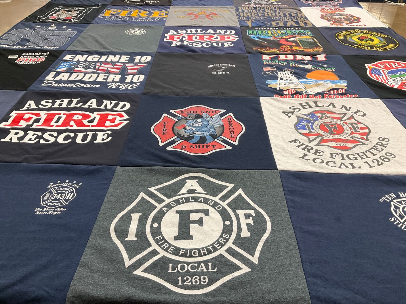 T-shirt quilt with firefighting, community service themes by Michael from OR