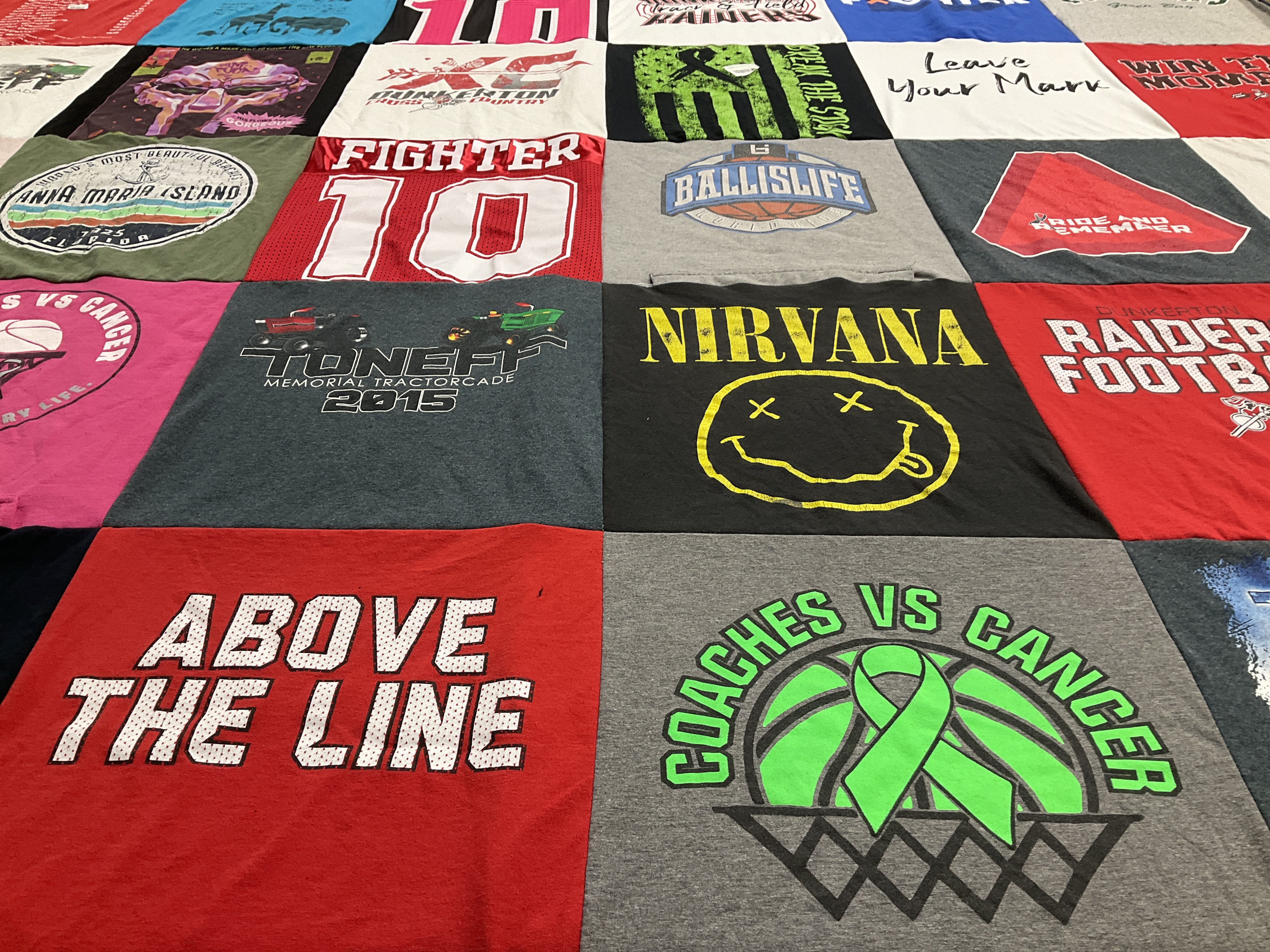 T-shirt quilt with music, sports themes by Tim from IA