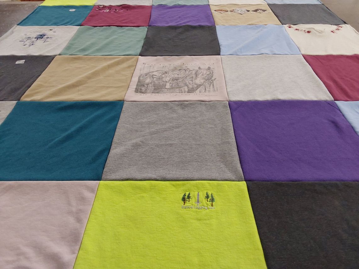 T-shirt quilt with hiking themes by Sandra from MT