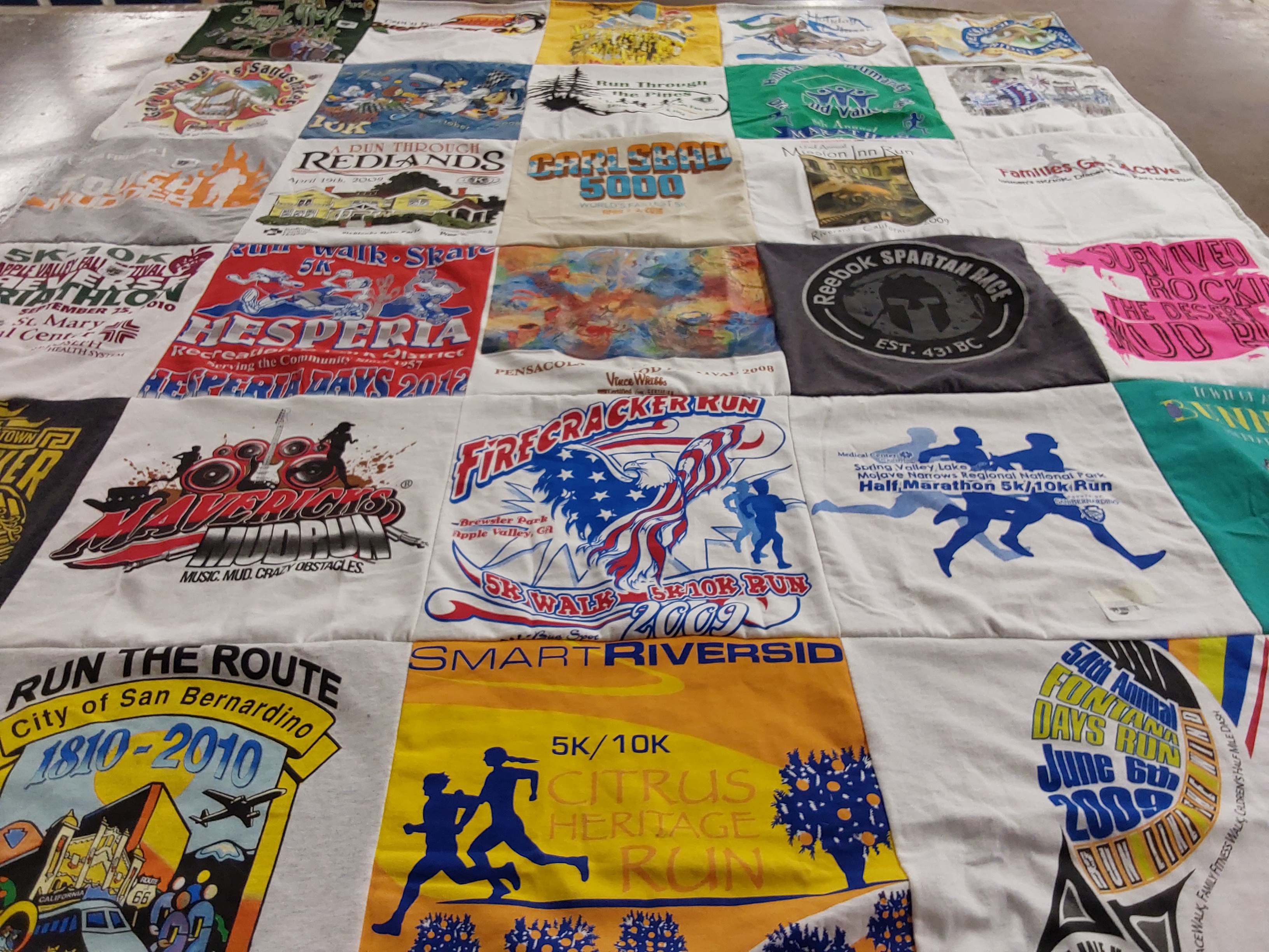 T-shirt quilt with running, marathons themes by Cathy from CA