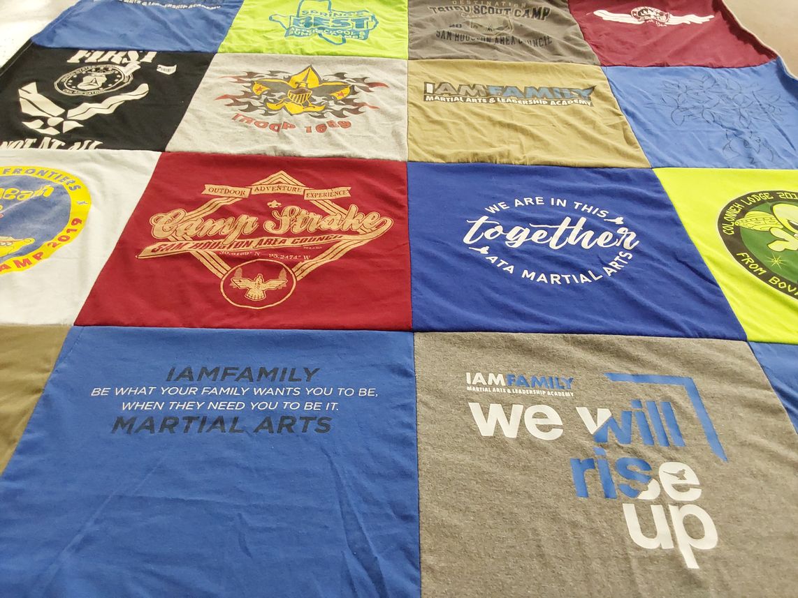 T-shirt quilt with martial arts, camping themes by Stacey from TX
