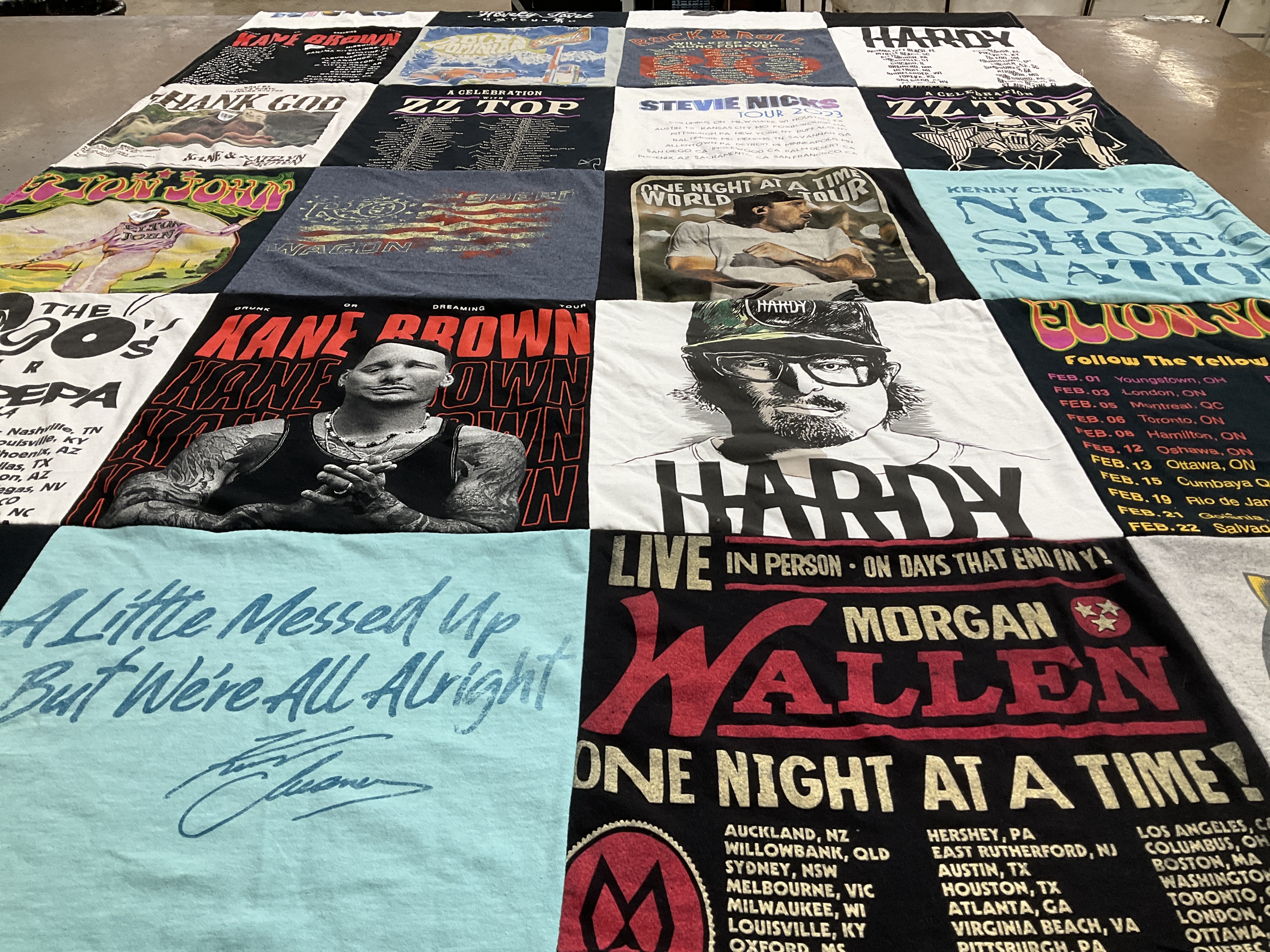 Custom Project Repat t-shirt quilt highlighting country music, music concerts themes.