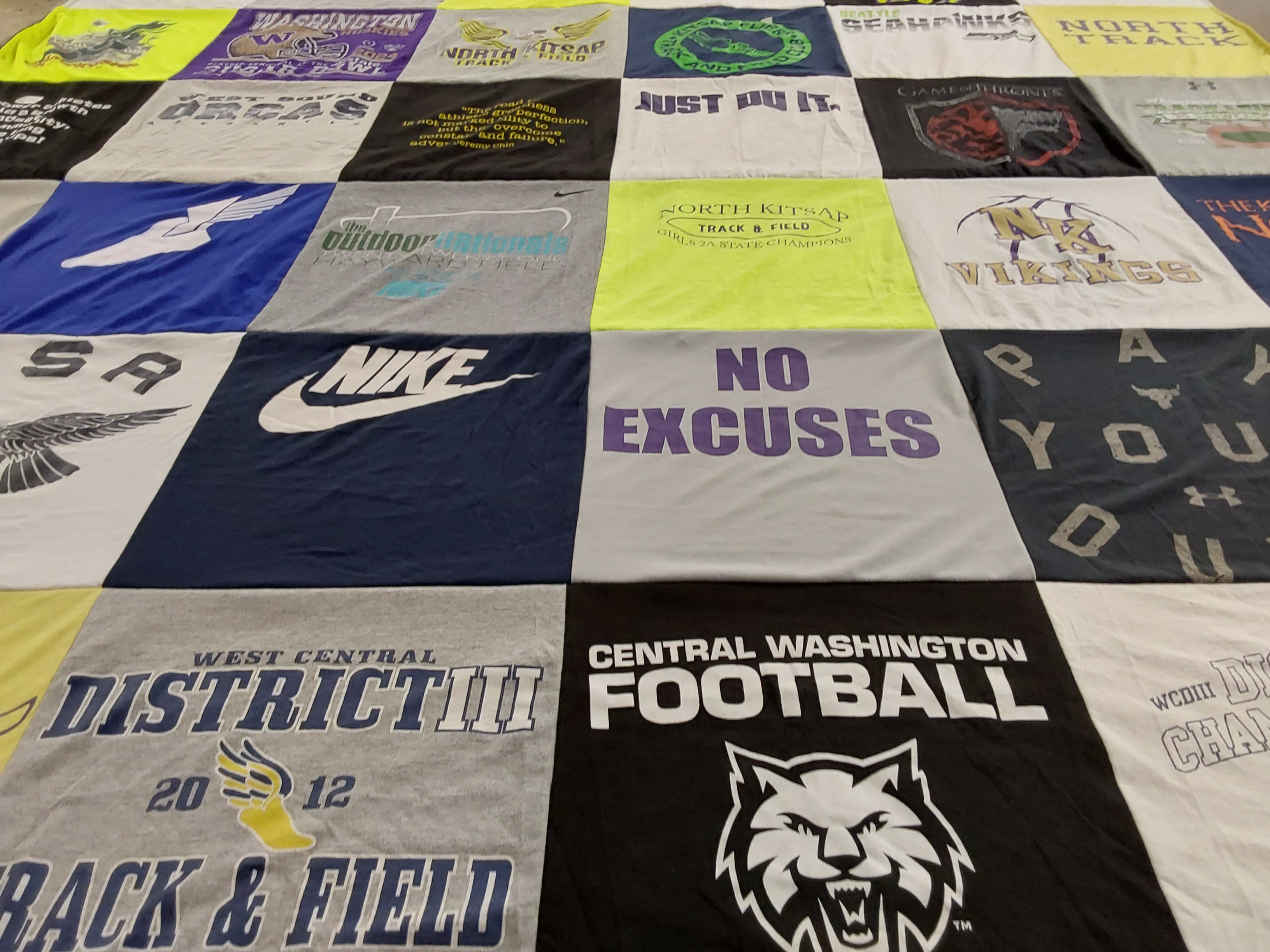 T-shirt quilt featuring north kitsap vikings, central washington football by Hannah from WA