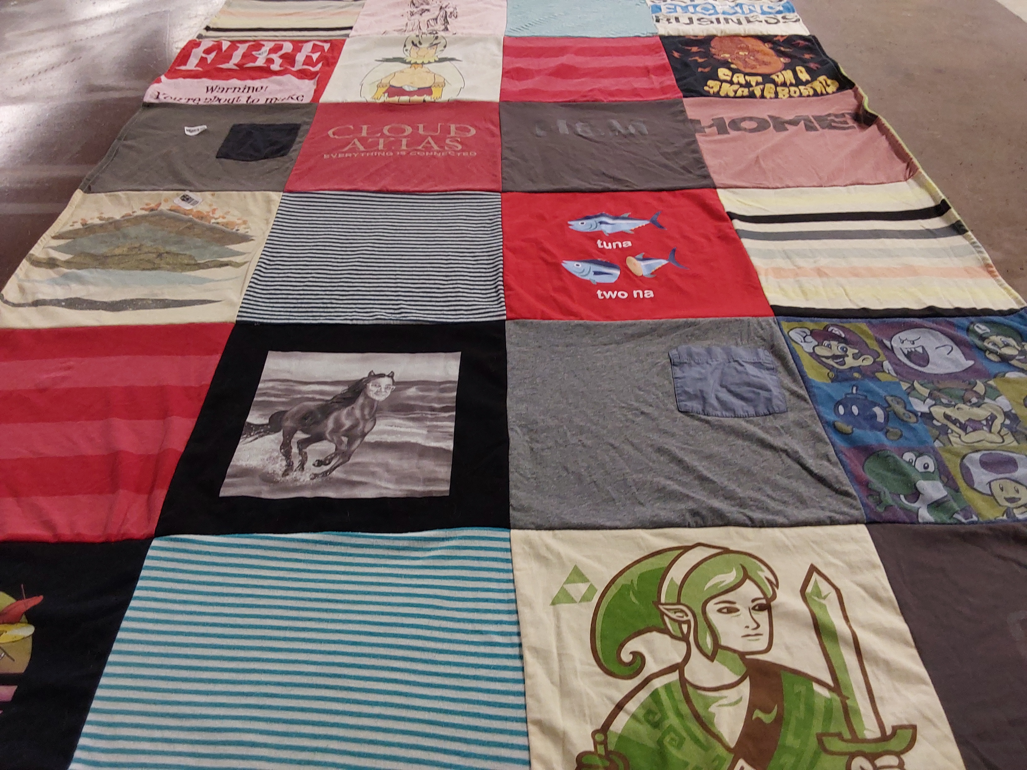 T-shirt quilt with gaming, literature themes by Barbara from WA