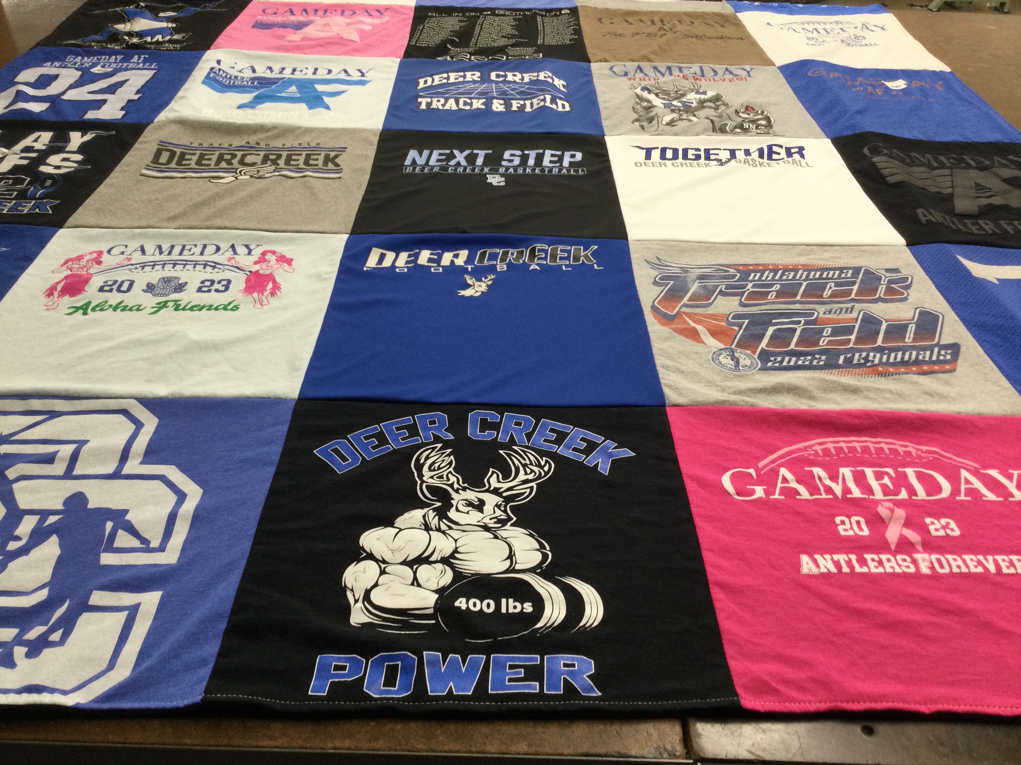 T-shirt quilt featuring deer creek high school sports by Angie from OK
