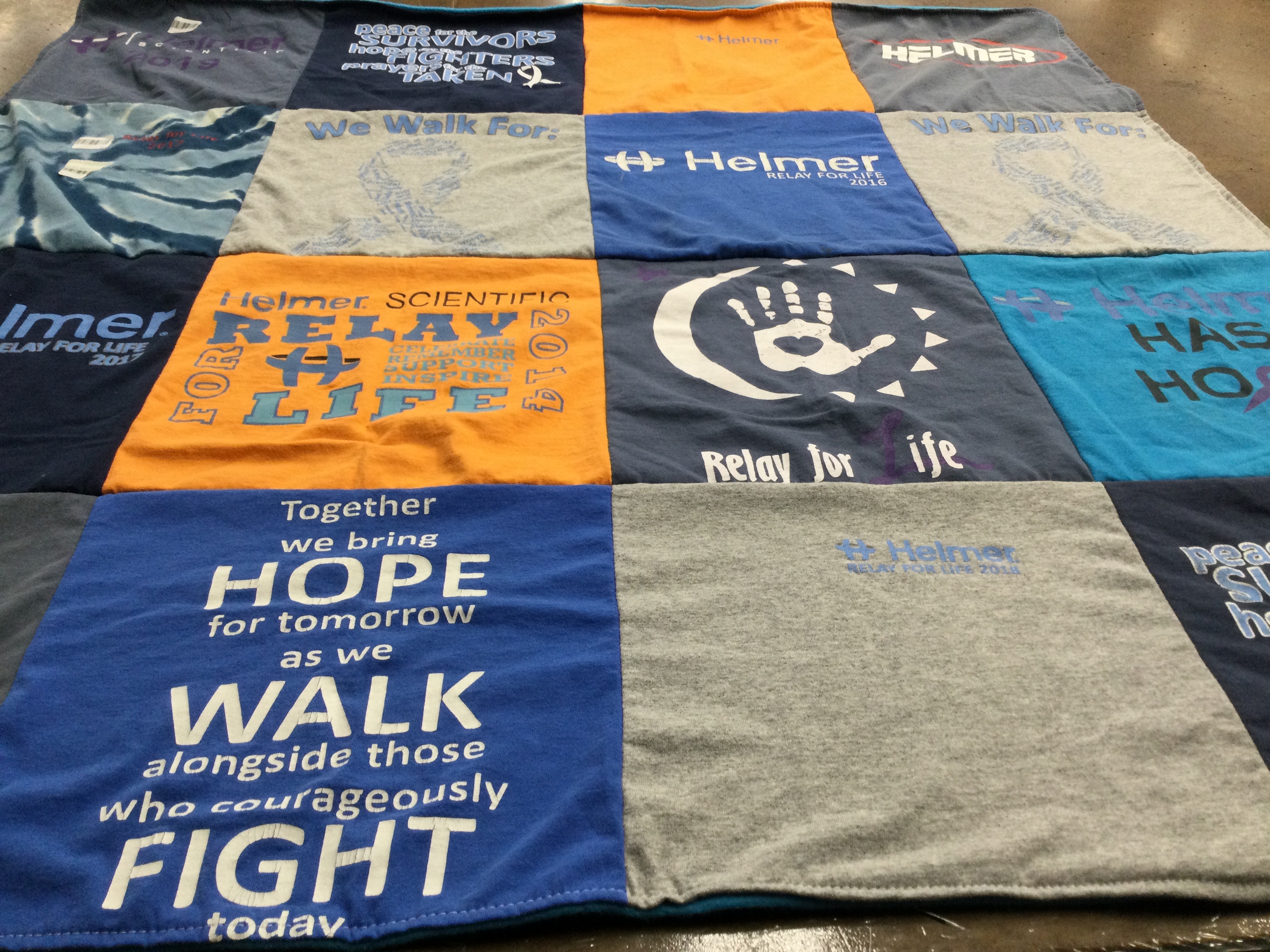 T-shirt quilt with cancer awareness, fundraising themes by Robyn from IN