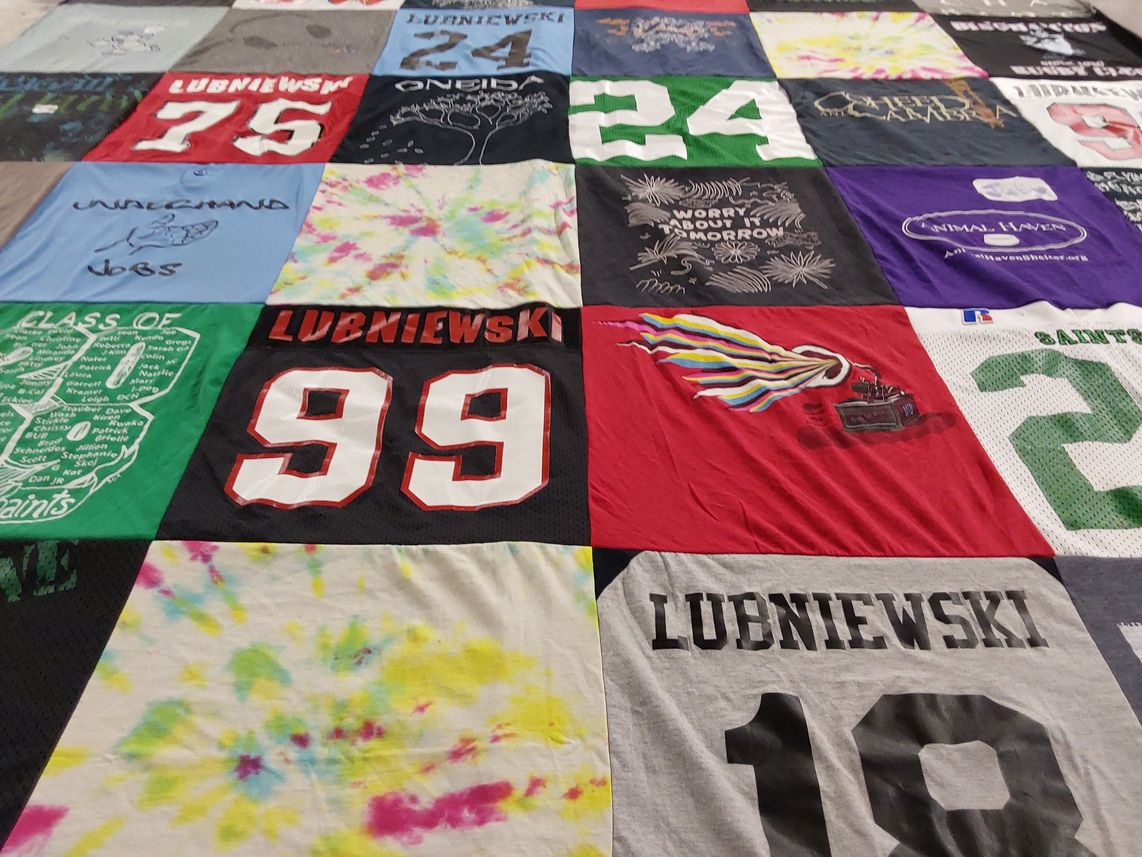 T-shirt quilt with sports, art themes by Garrett from NY