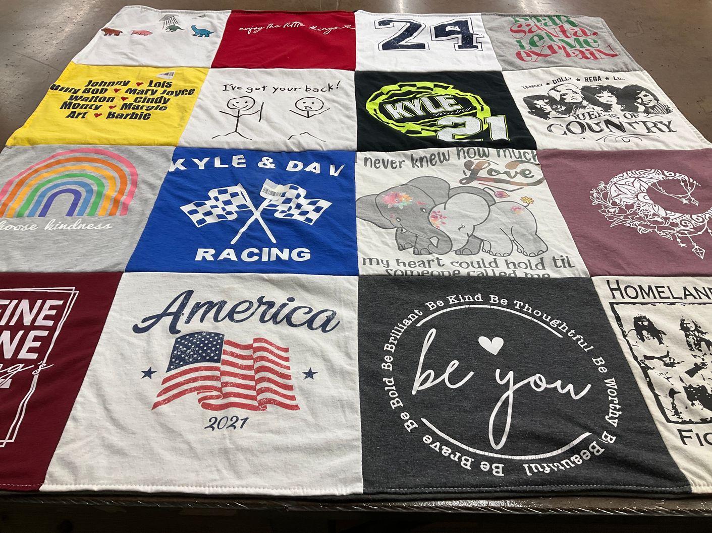 T-shirt quilt with racing, kindness themes by Barbara from NM