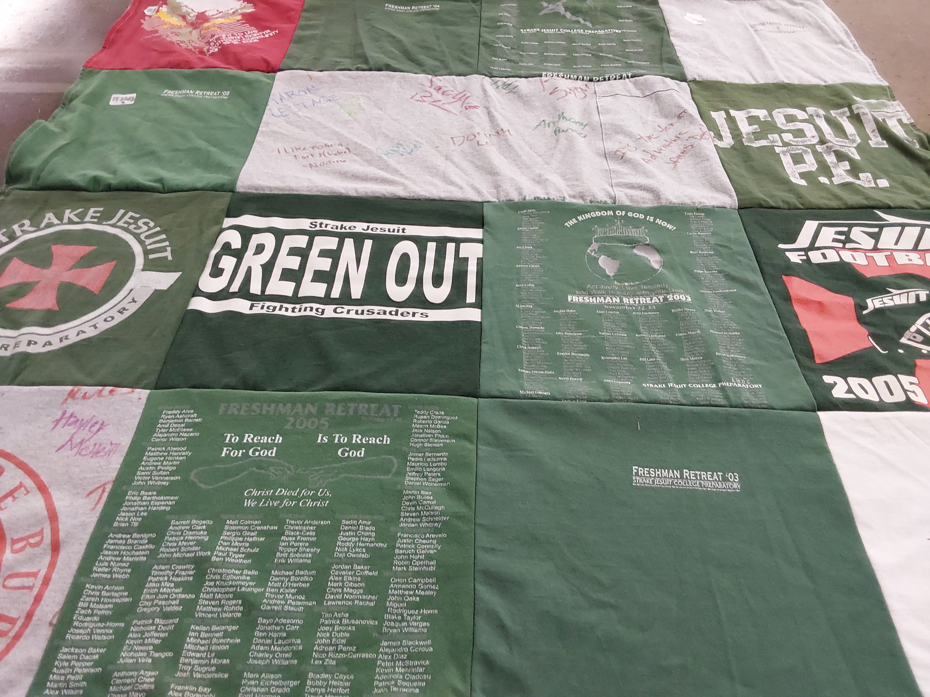Custom Project Repat t-shirt quilt featuring shirts from strake jesuit college preparatory.