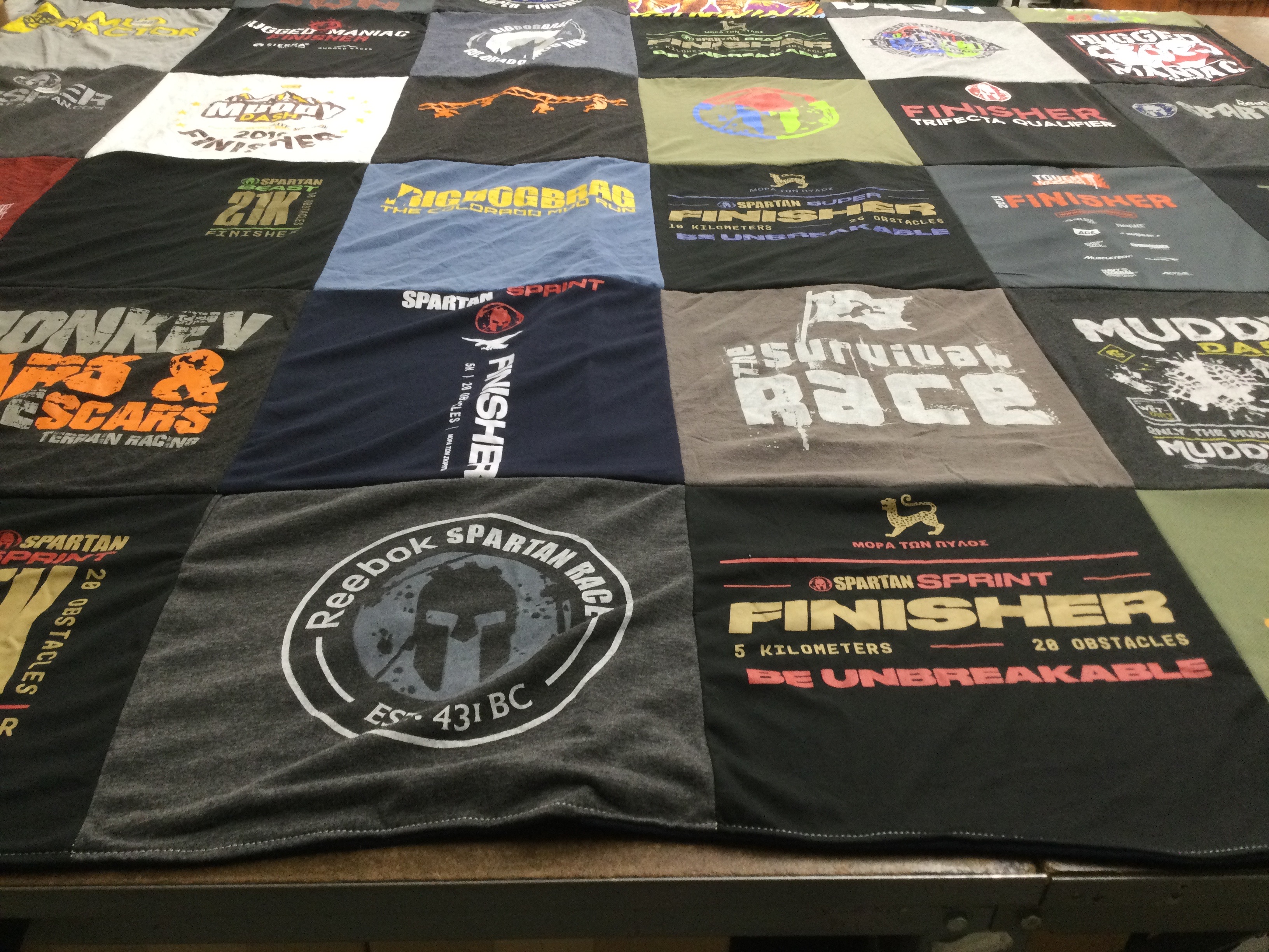 T-shirt quilt with obstacle racing, fitness themes by Dwight from CO