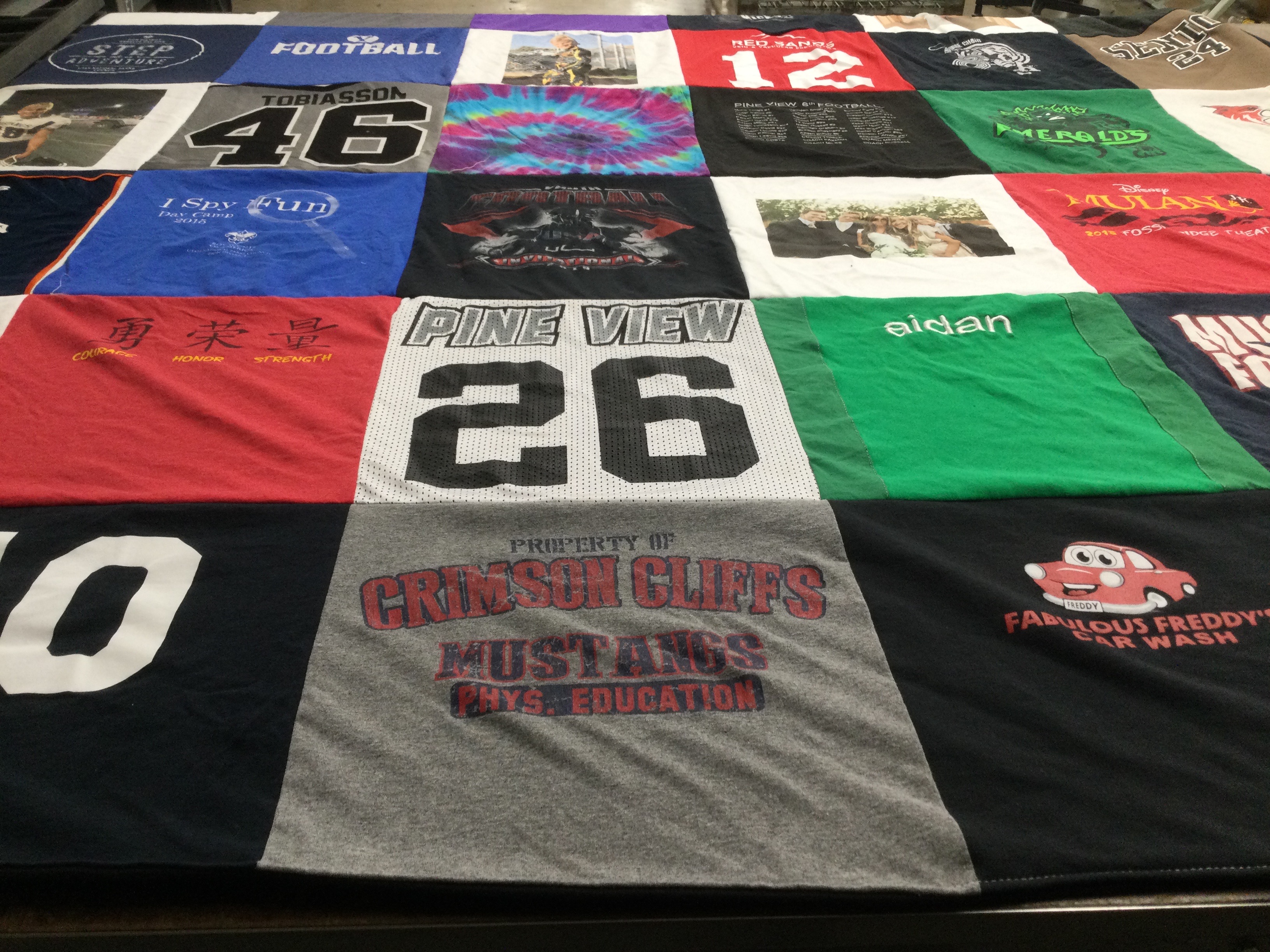 T-shirt quilt featuring crimson cliffs mustangs by Bethany from UT