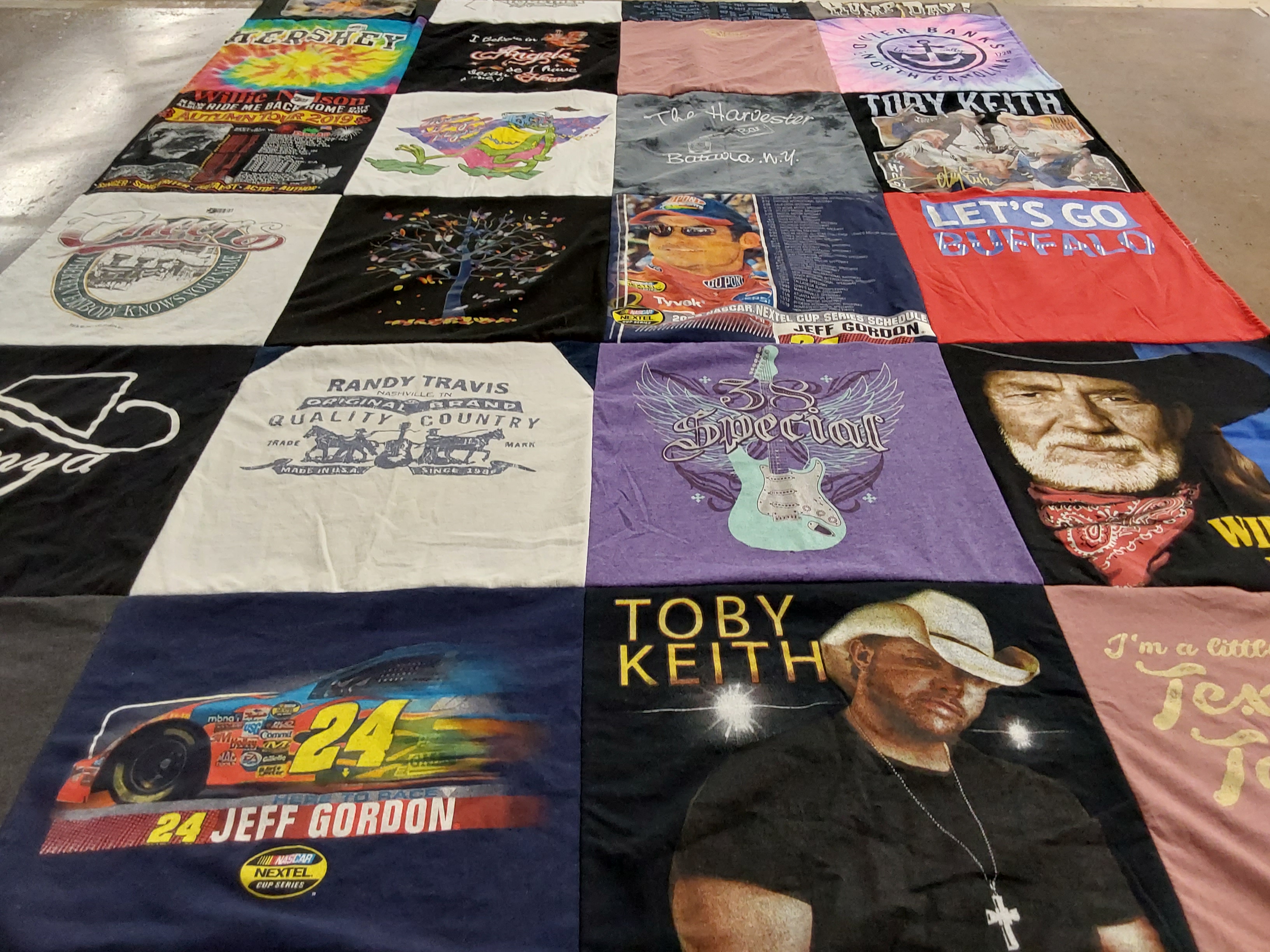 T-shirt quilt with country music, nascar themes by Donnna from NY