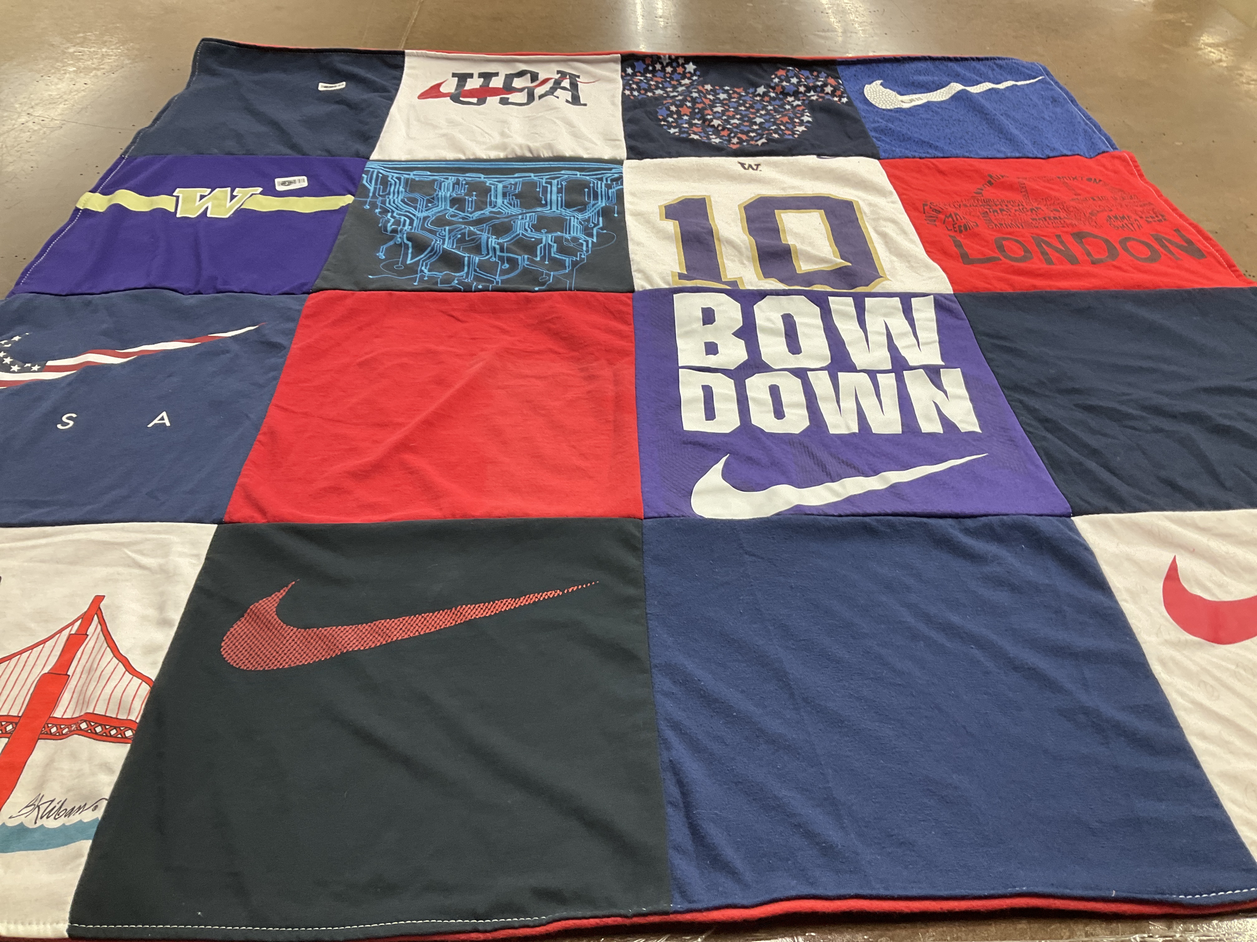 Custom Project Repat t-shirt quilt featuring shirts from university of washington.